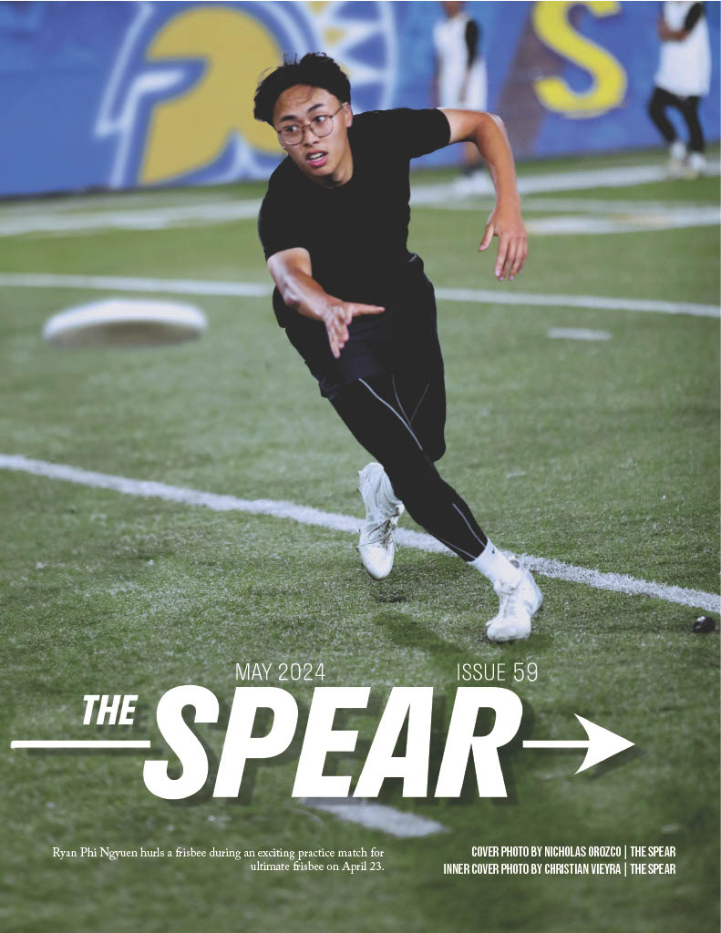 Student athlete catching frisbee