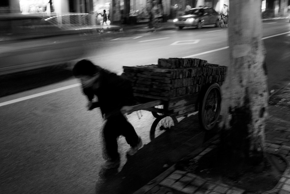 Working late, Shanghai, China, 2008