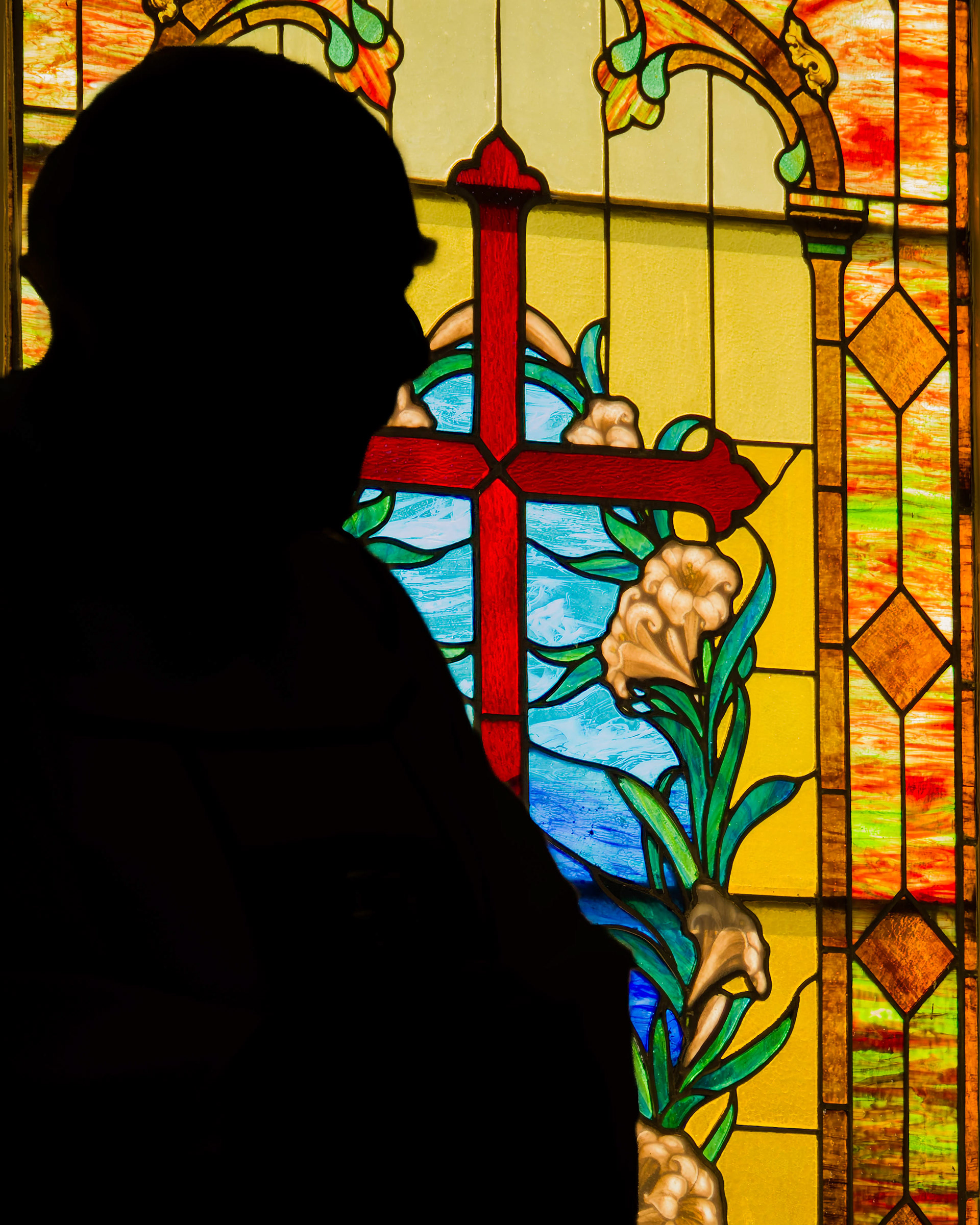 A priest in silhouette