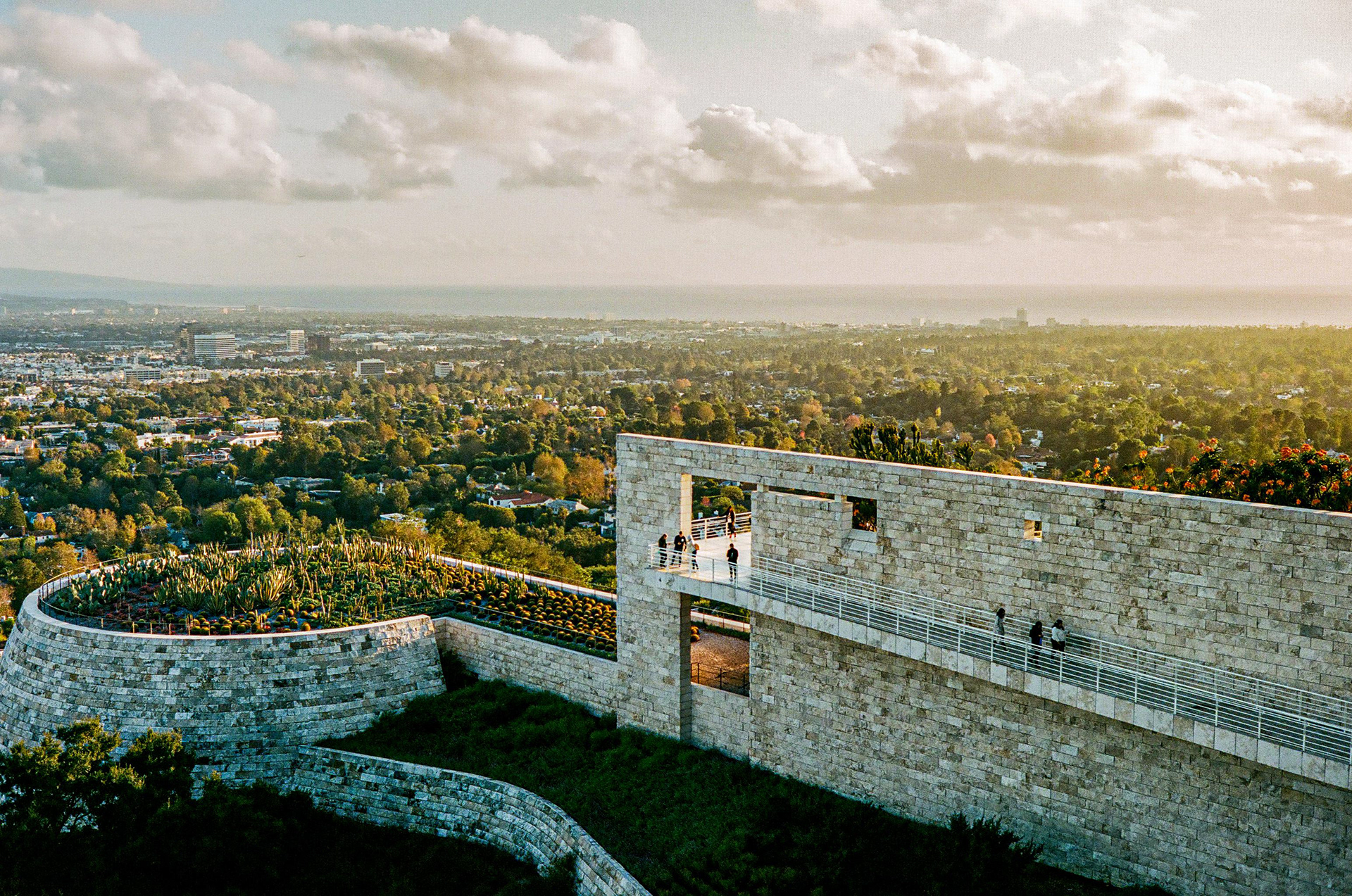 Sunlit terraces and stone architecture overlooking Los Angeles at Getty Center, photographed on 35mm format film. Explore the full series at dyoon.space.