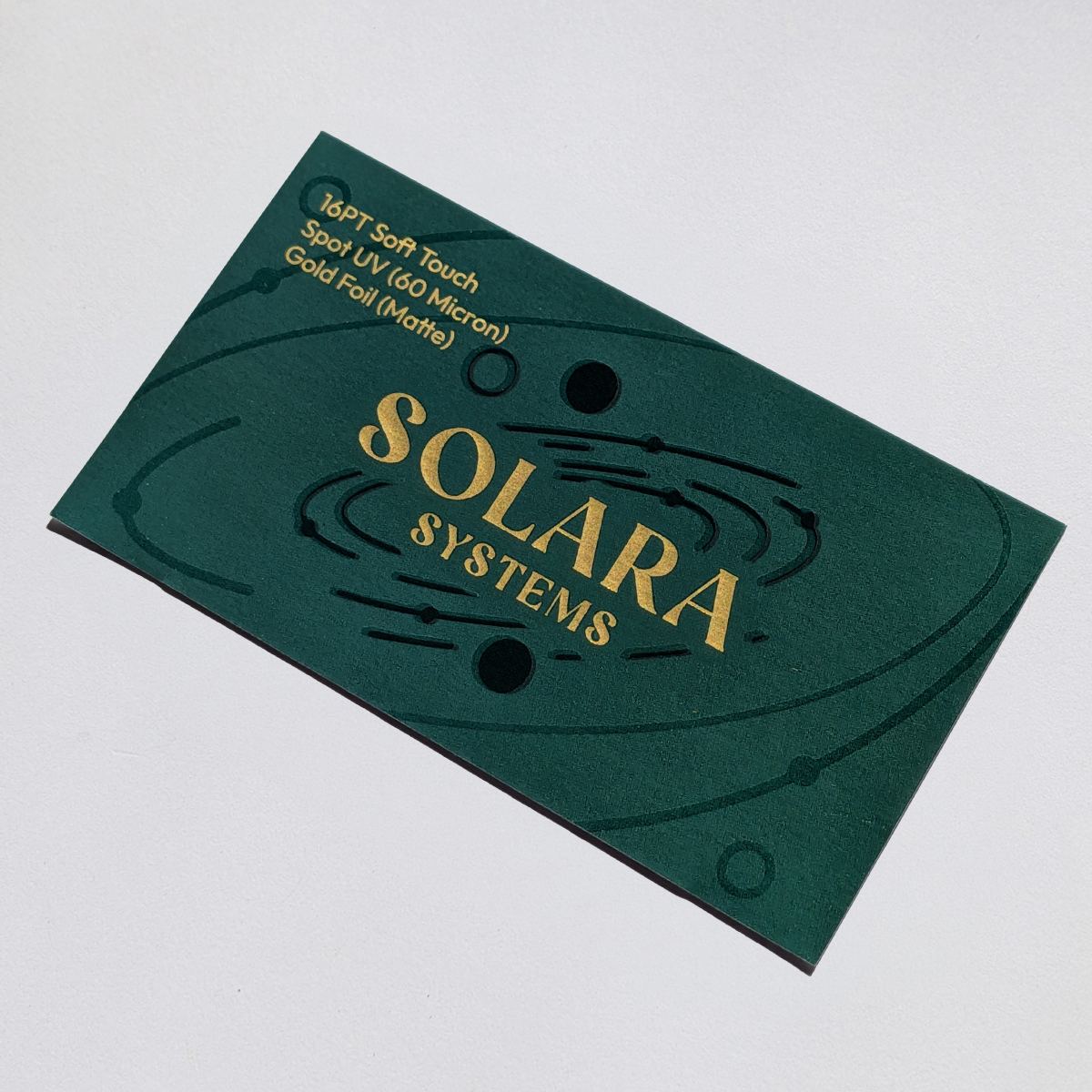 Raised gold foil and Raised UV