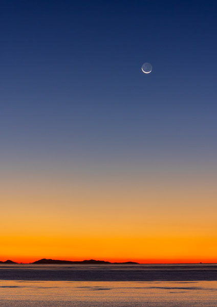 Crescent moon over Marlborough Sounds