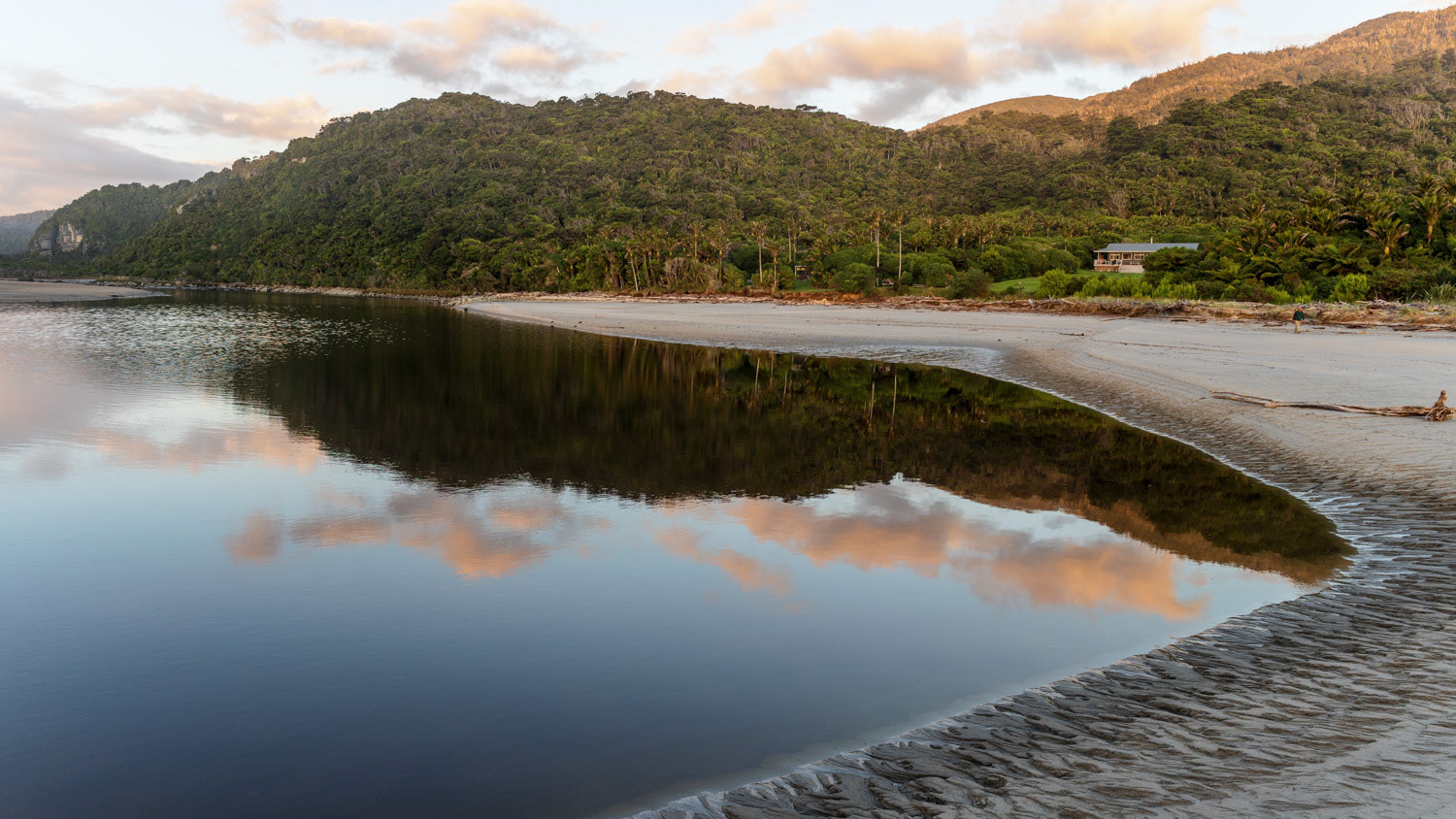Heaphy Hut at the mouth of the Heaphy River.