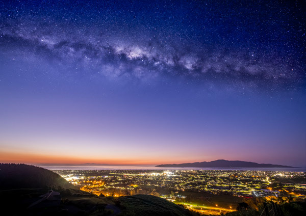 Milky Way over Paraparaumu: This photo from the top of Nikau Reserve needed two exposures 15 minutes apart to avoid the smothering light pollution over Paraparaumu.