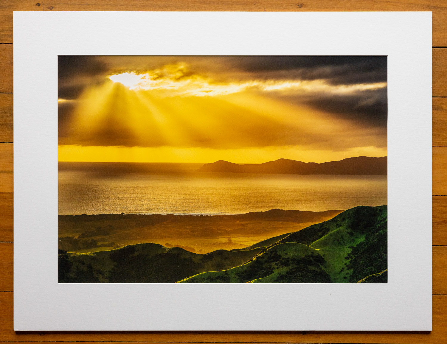 Golden beams over Kapiti. View from the top of Mt Wainui, behind Paekakariki