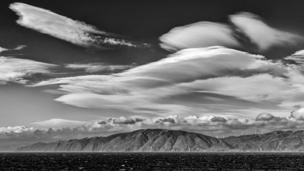Nor’wester at Cape Terawhiti Strong wind create lenticular clouds over the Makara wind farm
