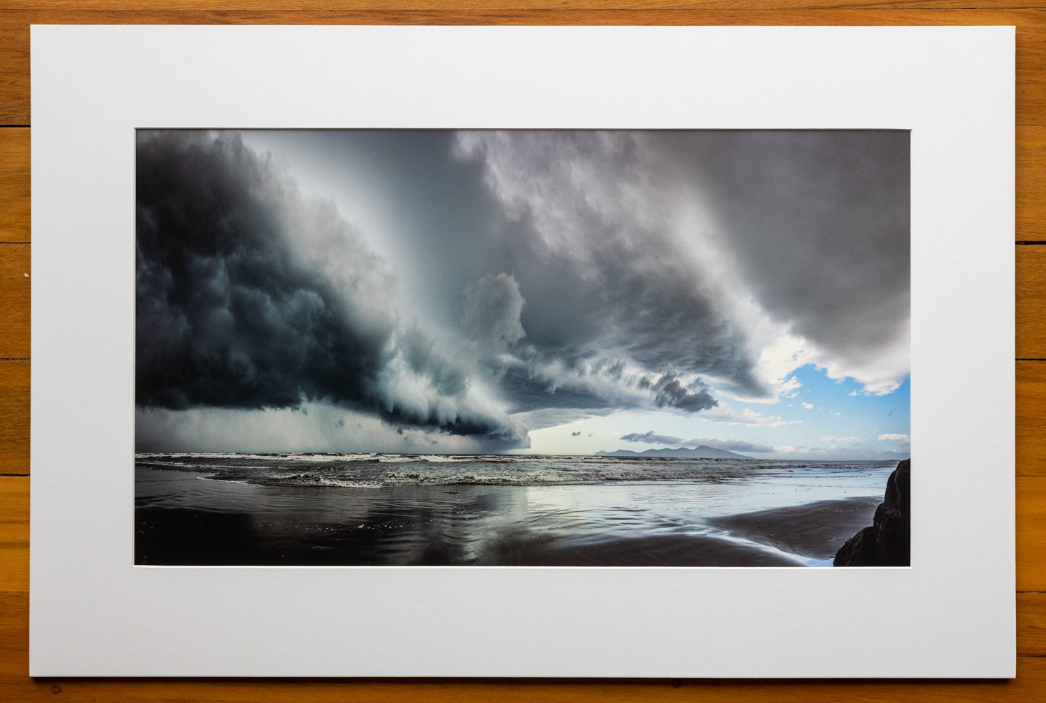 Approaching storm. A fierce southerly front swept up the coast, with Kapiti Island still in sunshine. Moments later, the deluge caught me!