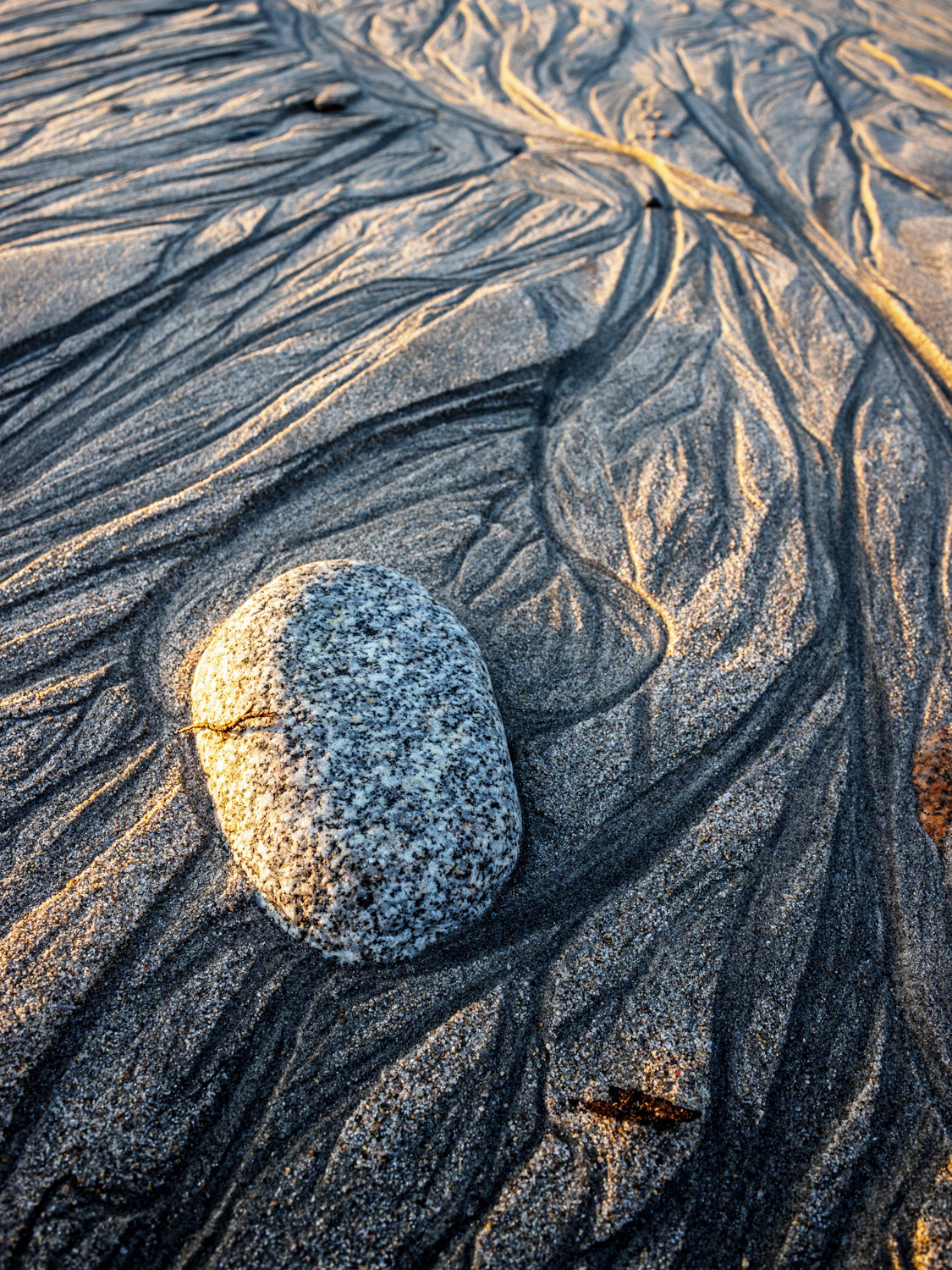 Rock and sand sculptures along the river