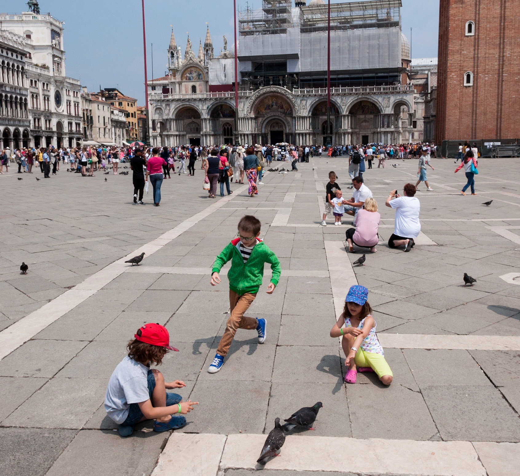 Children and pigeons, St. Mark's Square, Venice, 2014