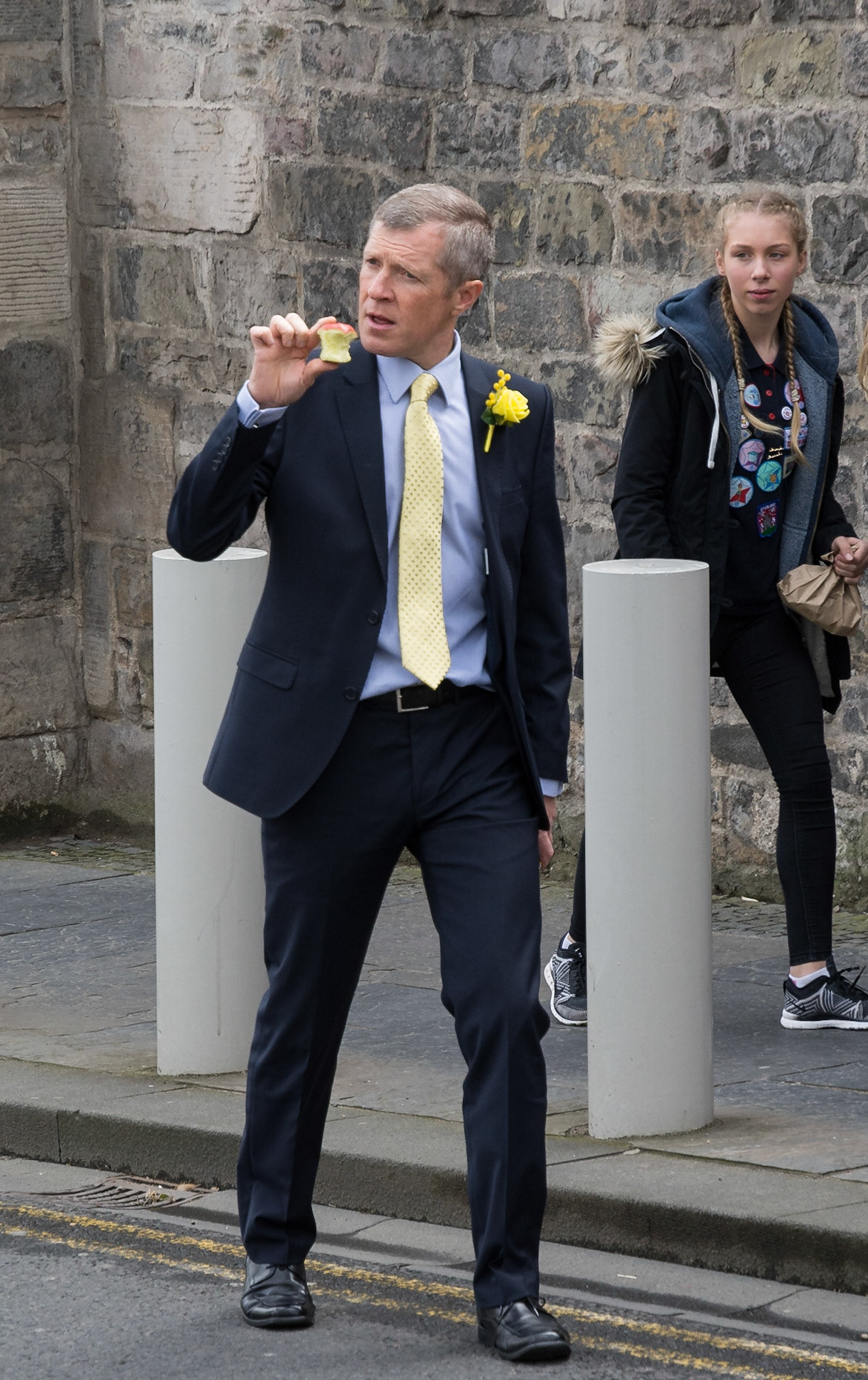 Willie Rennie eating an Apple after the Celebrations for the Opening of the Fifth Session of the Scottish Parliament, Edinburgh, 2016