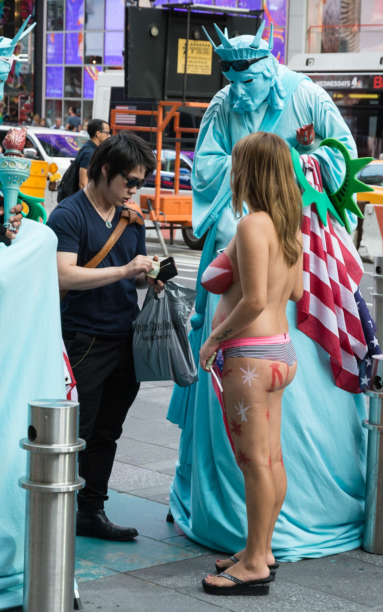 Paying up, Times Square, New York, 2016