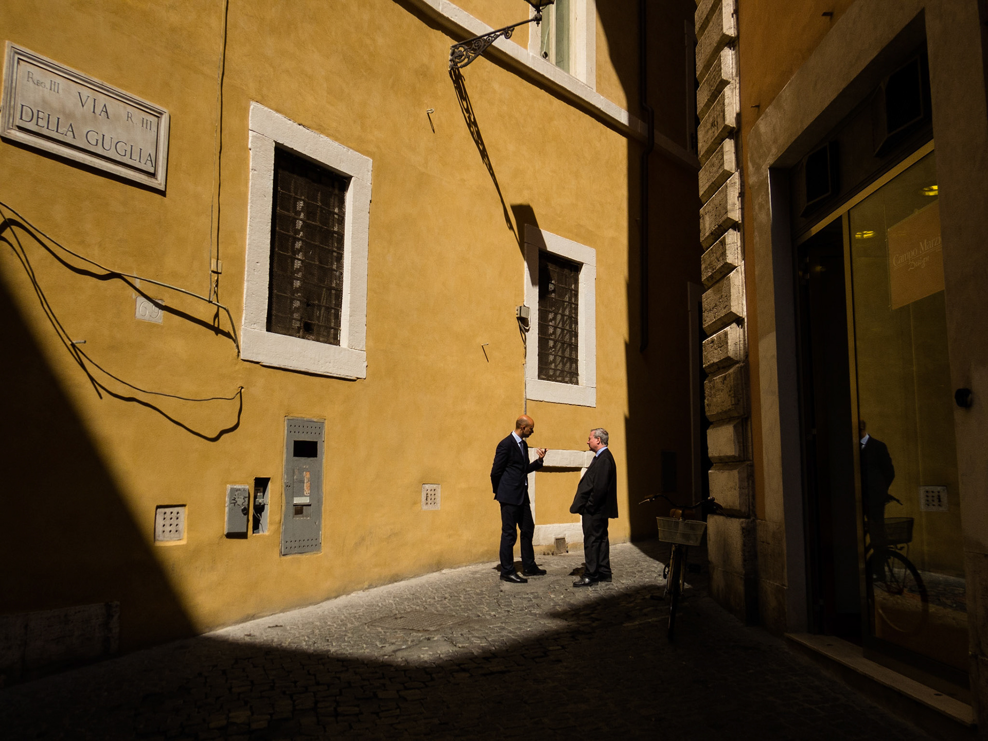 In conversation, Via della Guglia, Rome, 2013