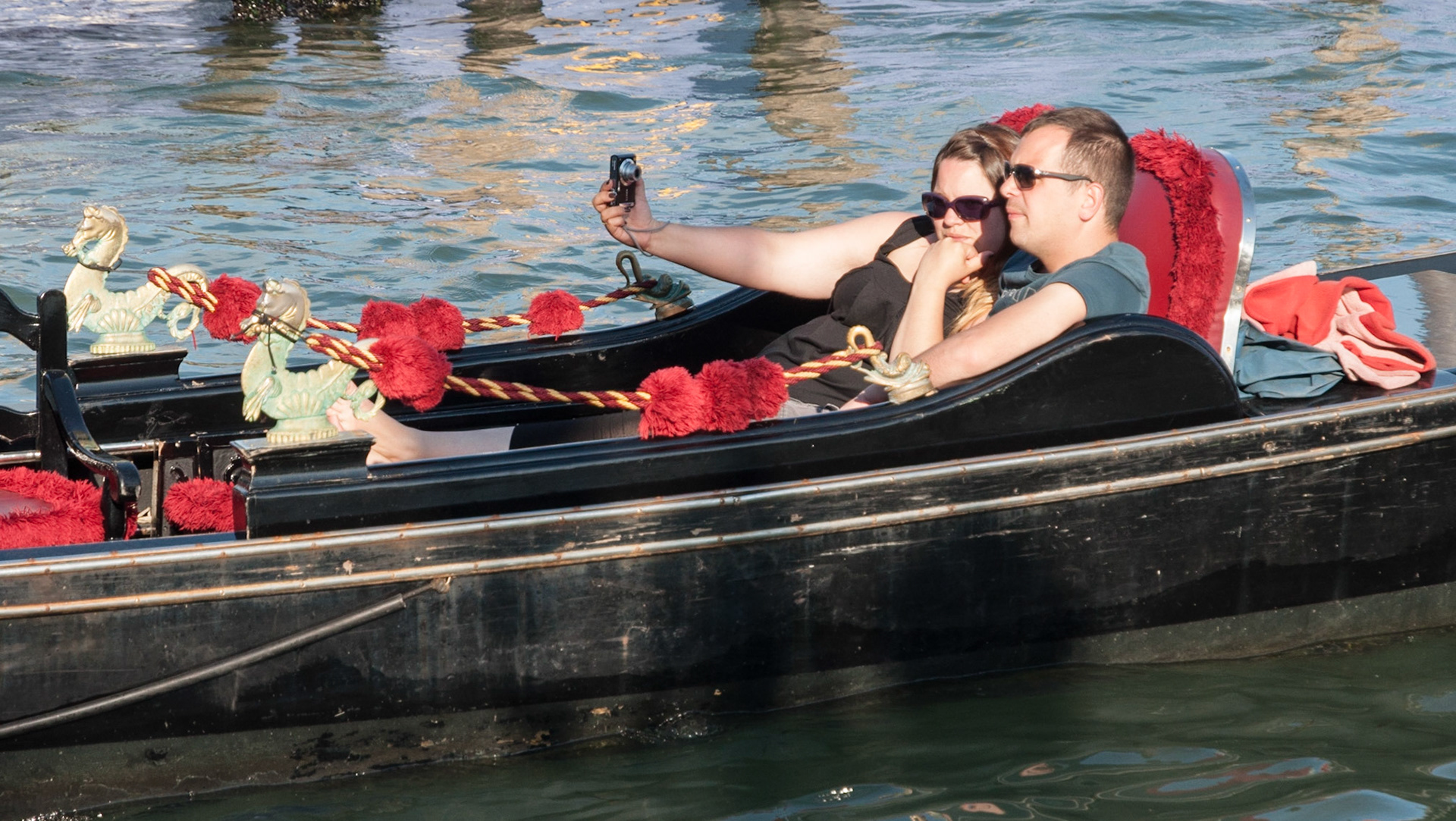 Taking a selfie on a gondola, Venice, 2014