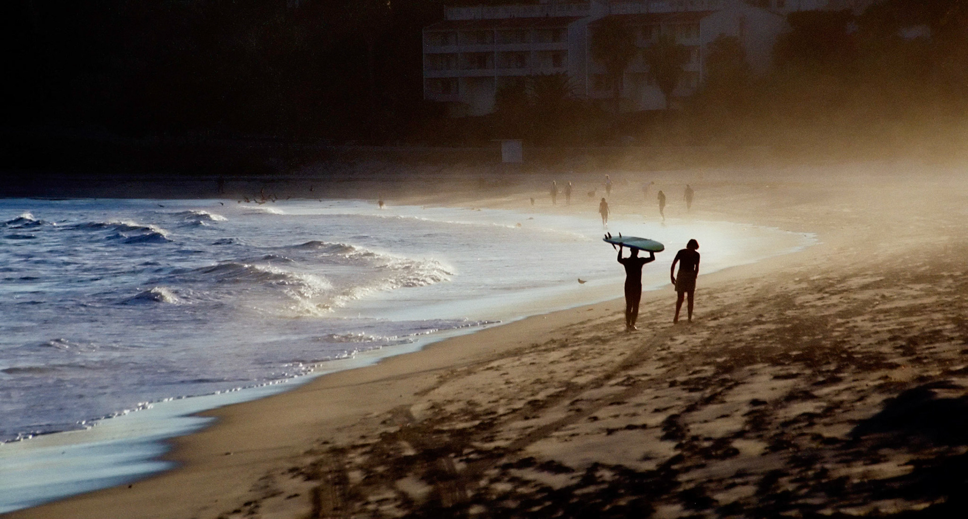 Surfers on the beach, Santa Barbara, California, 2000