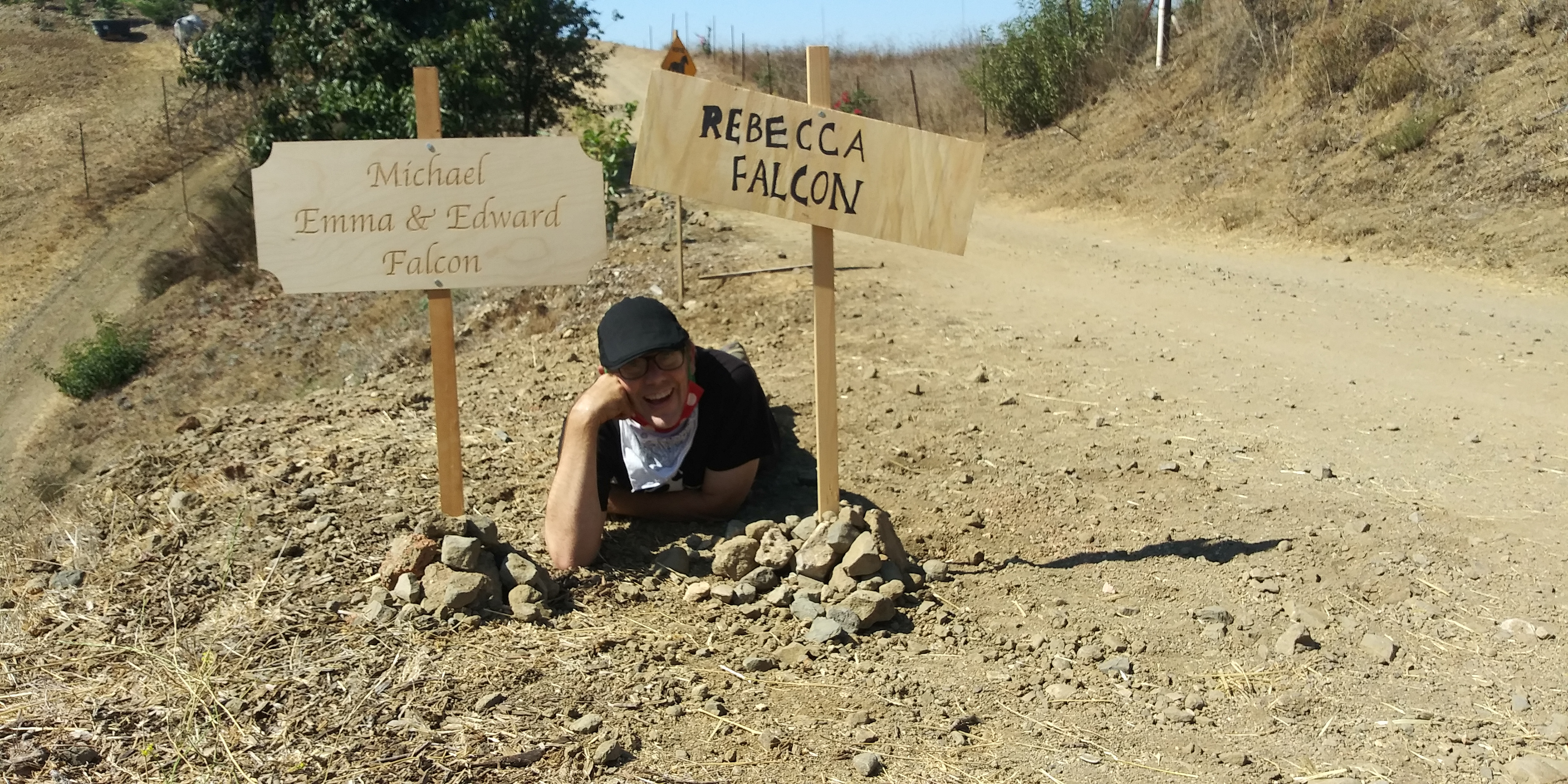Writer/Director Robert Christopher Smith posing between the gravemarkers he just set up.