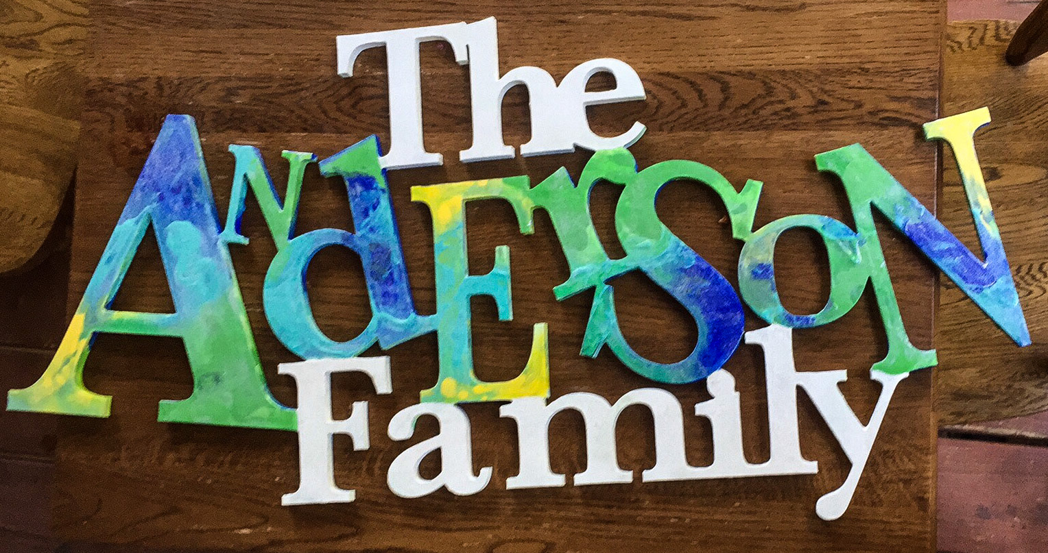 Custom Designed and Painted Wood Cut Sign
