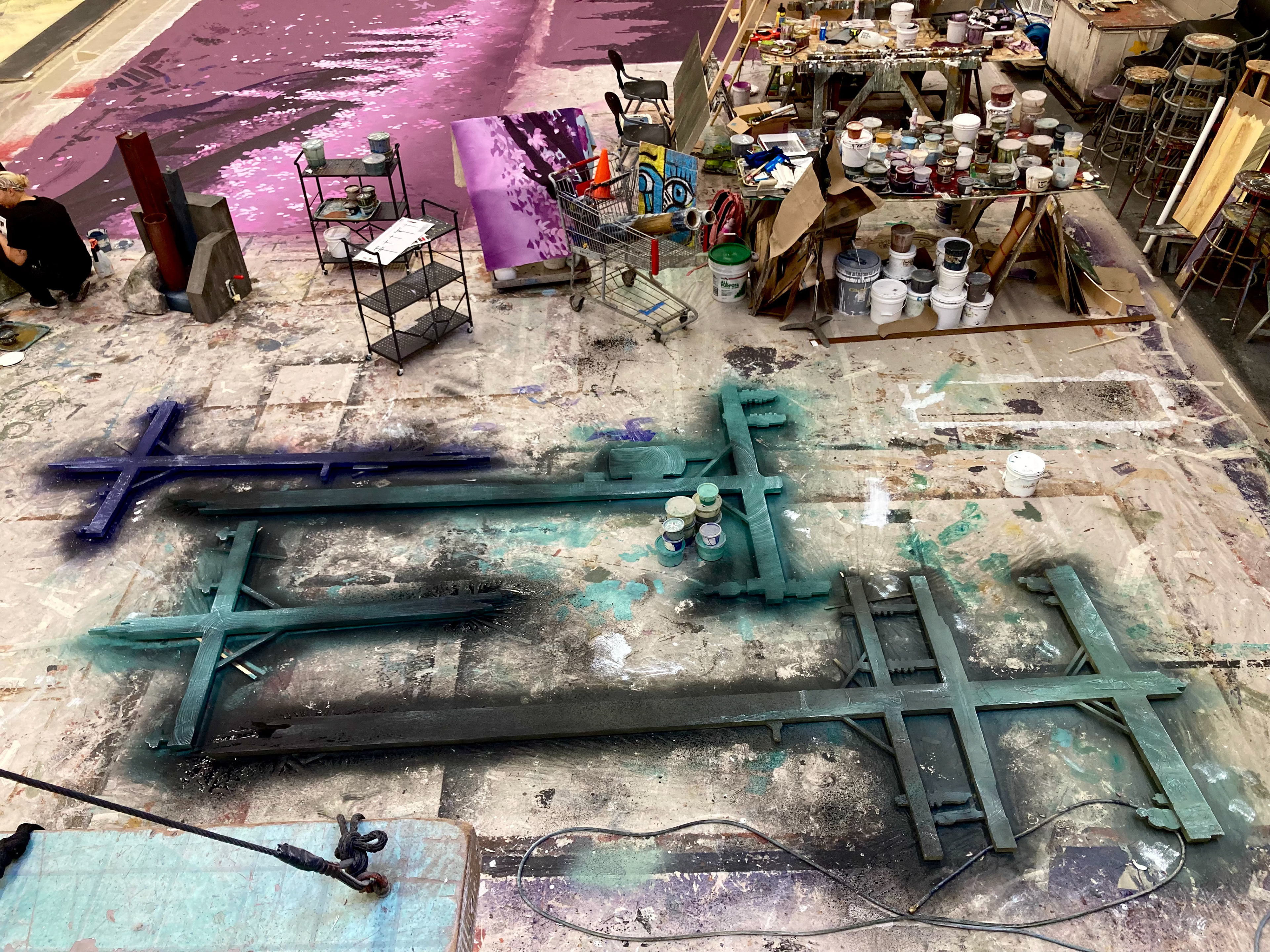 'Power line' proscenium finished with texture, HVLP pneumatic sprayers, and dry brushing techniques.