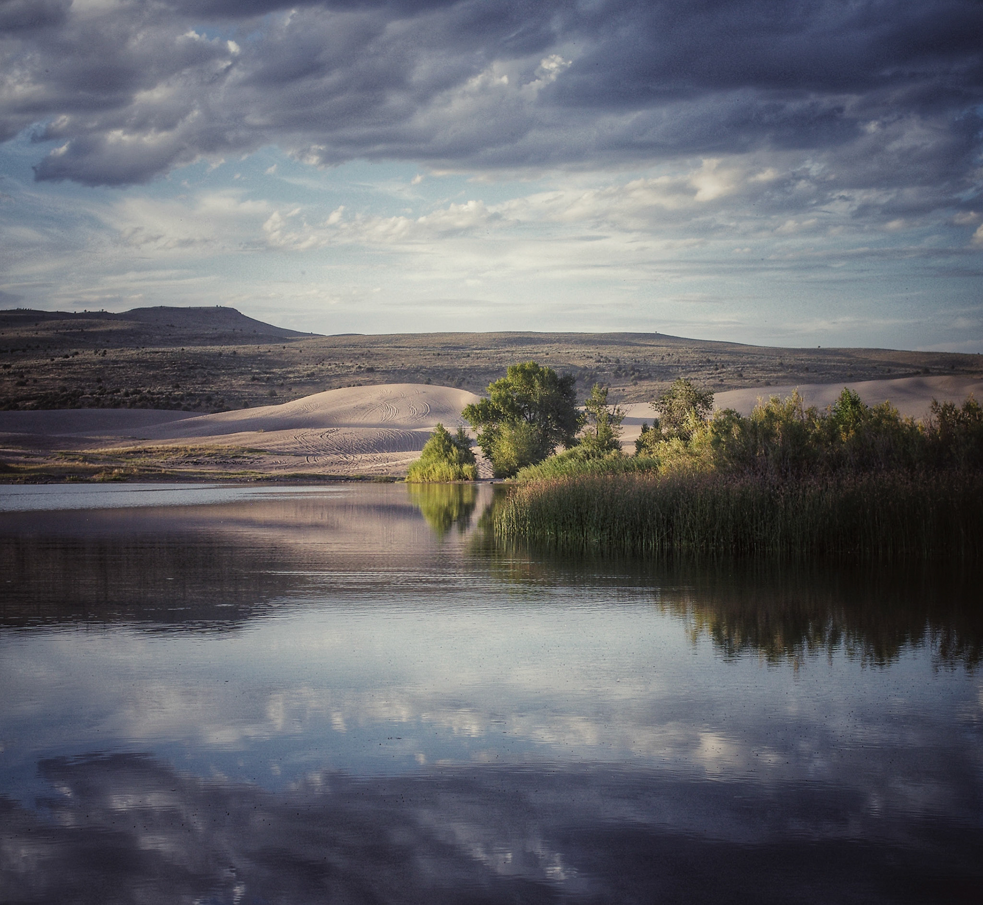 Dunes beyond the lake