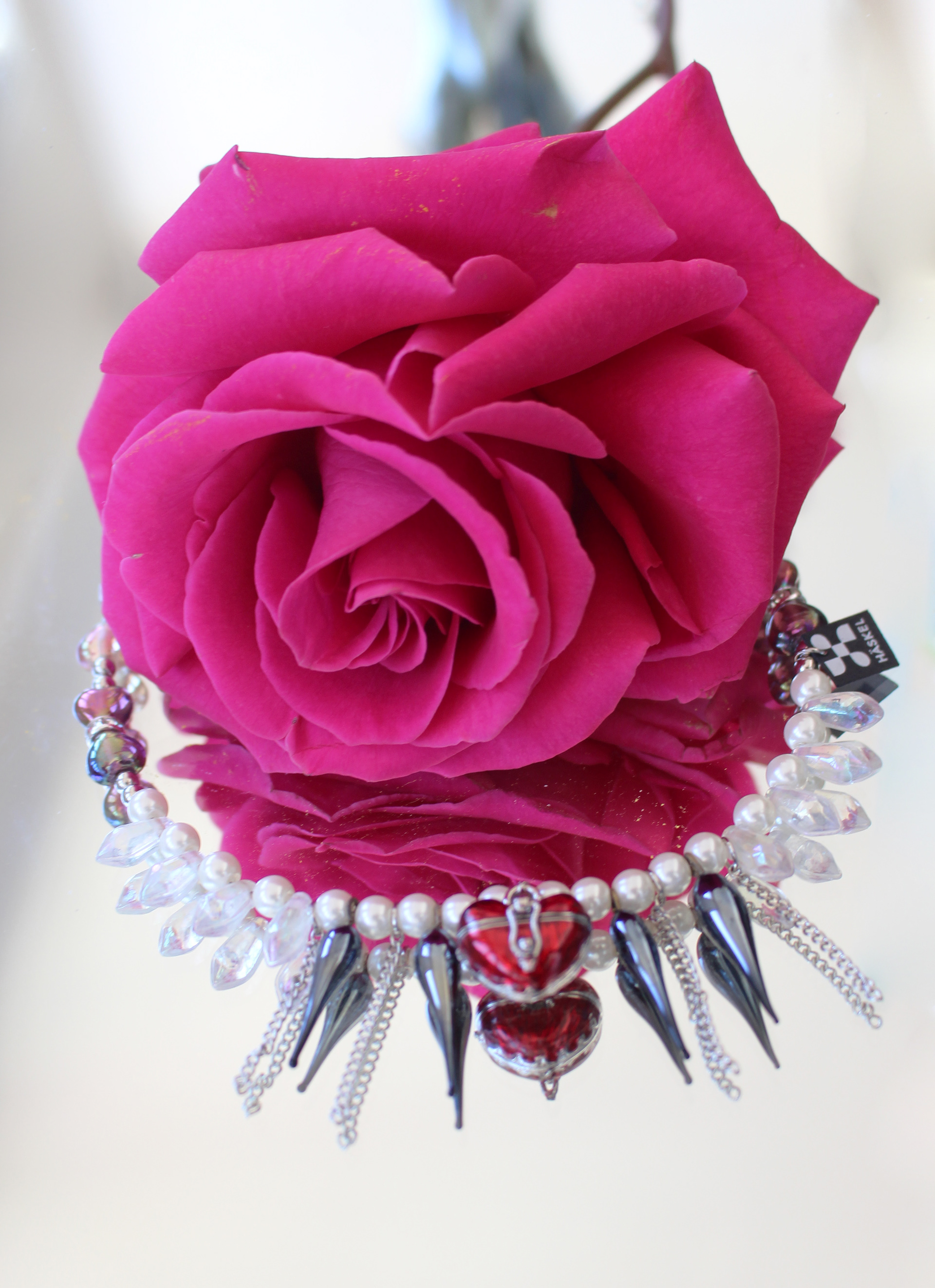 Pearl necklace designed with high quality vintage pearls, glass tears and Murano glass. Heart locket rest.