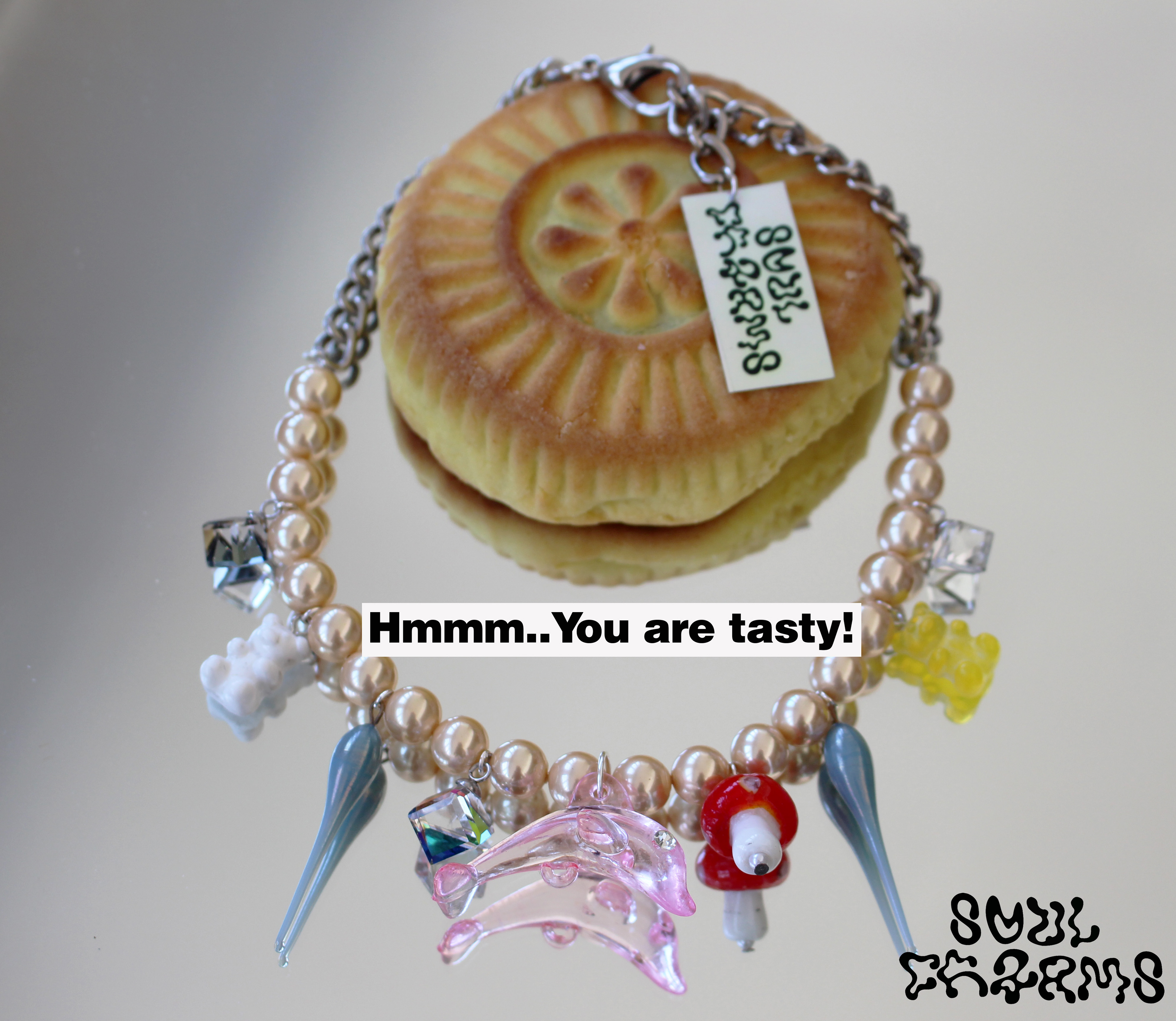 Necklace designed with high quality vintage pearls, Swarovski and other selected charms.