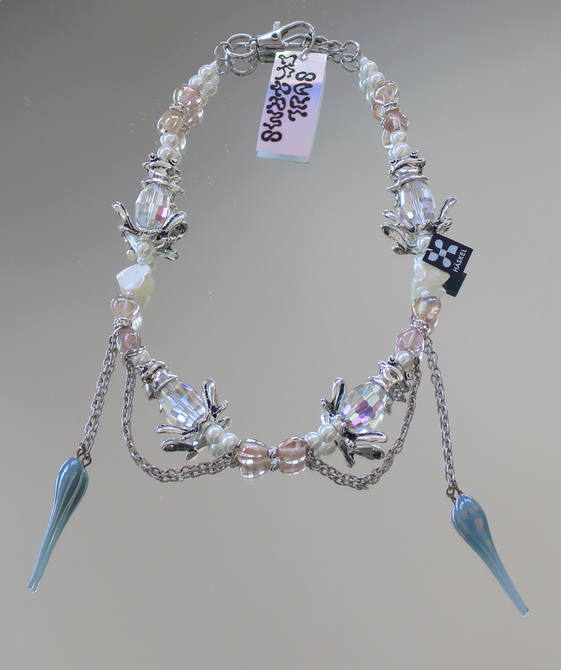 Long choker designed with high quality vintage pearls, silver frogs and Murano glass.