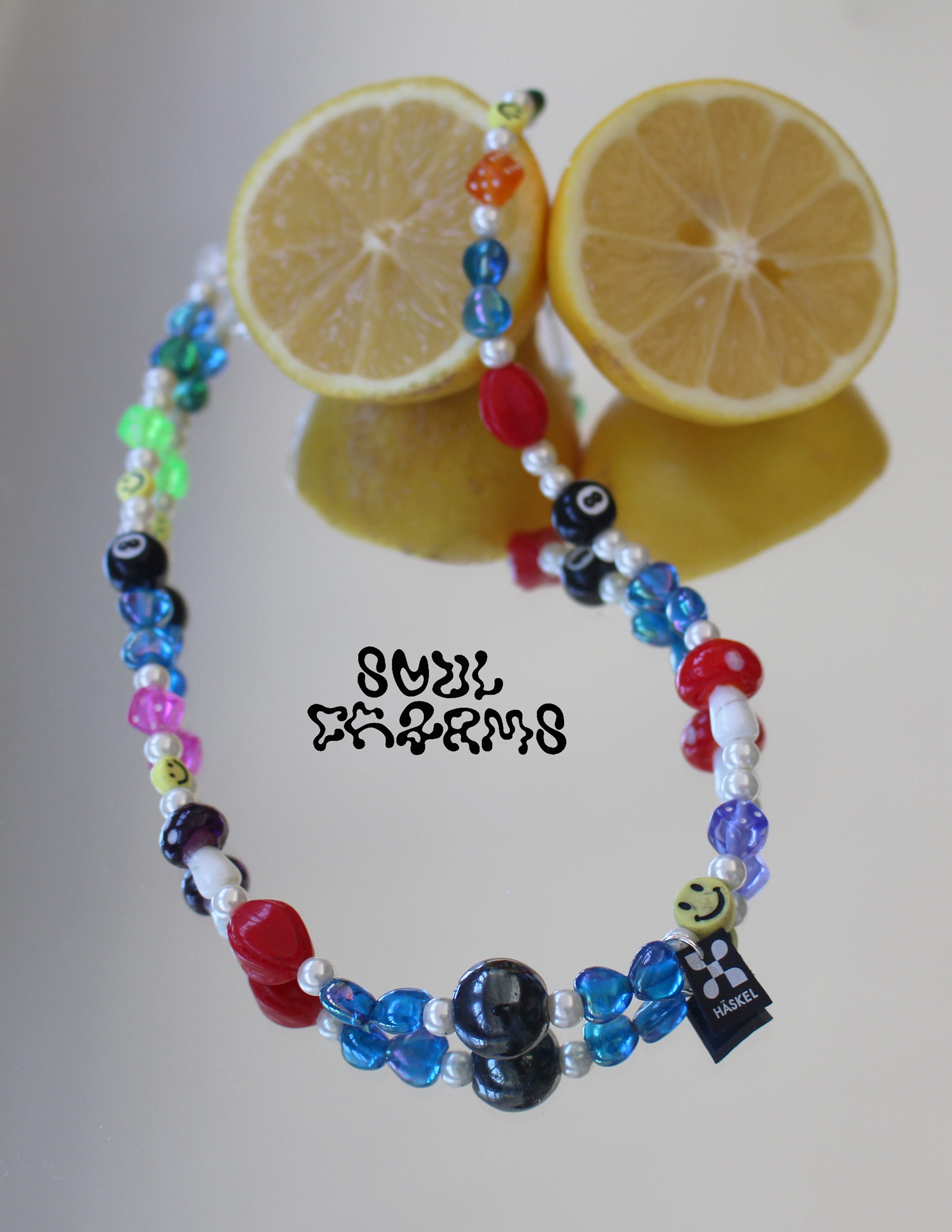 Long choker designed with colected vintage pearls and galvanised glass hearts.