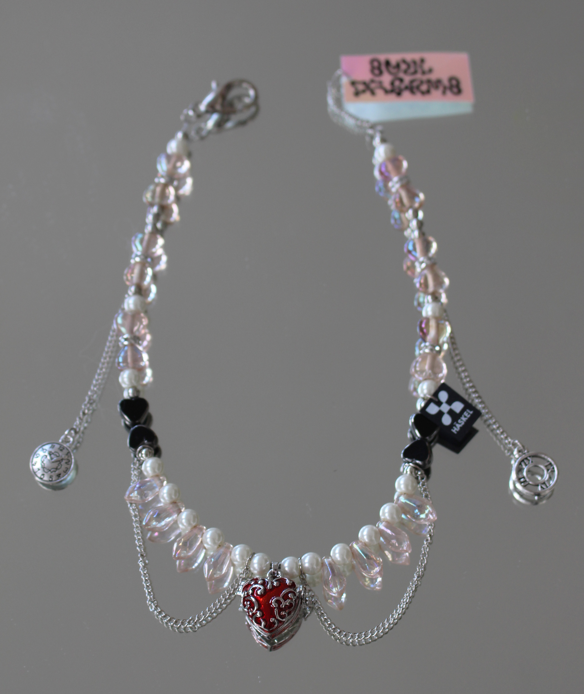 Long choker created with high quality vintage pearls, Swarovski pearls and locket charm..