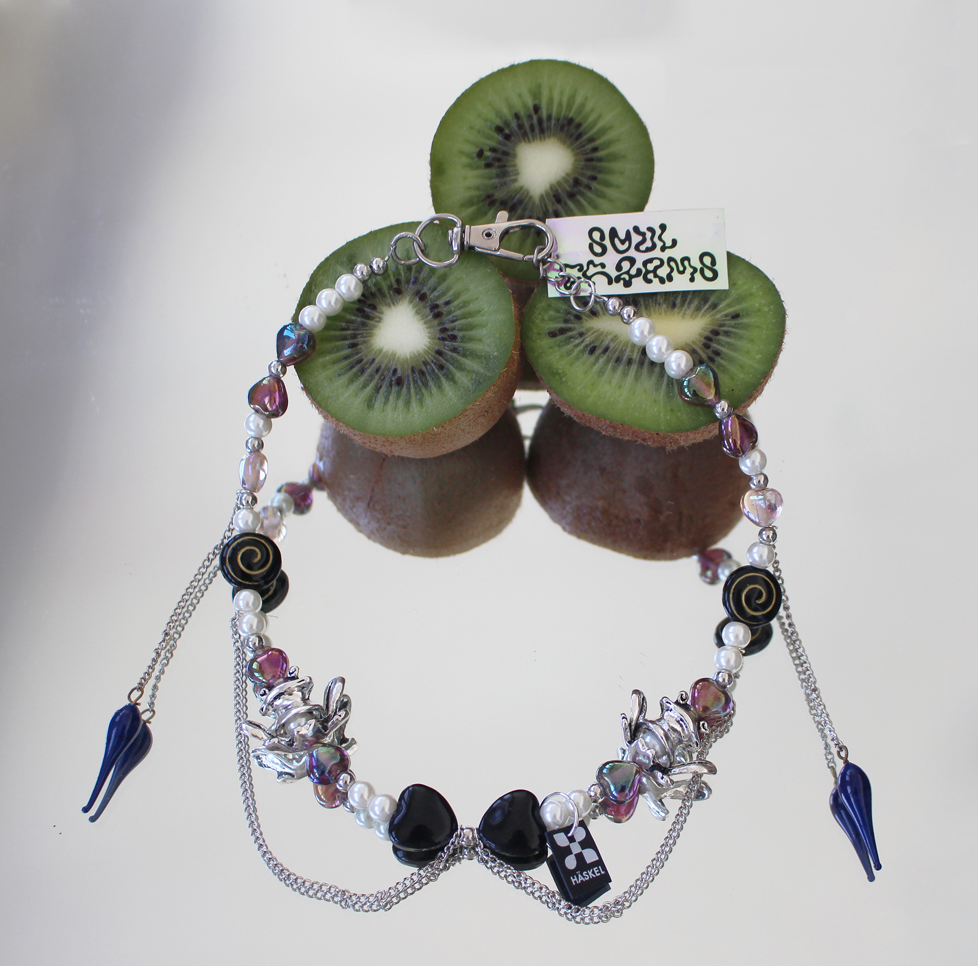 Long choker created with high quality vintage pearls, silver frogs and Murano glass charms.