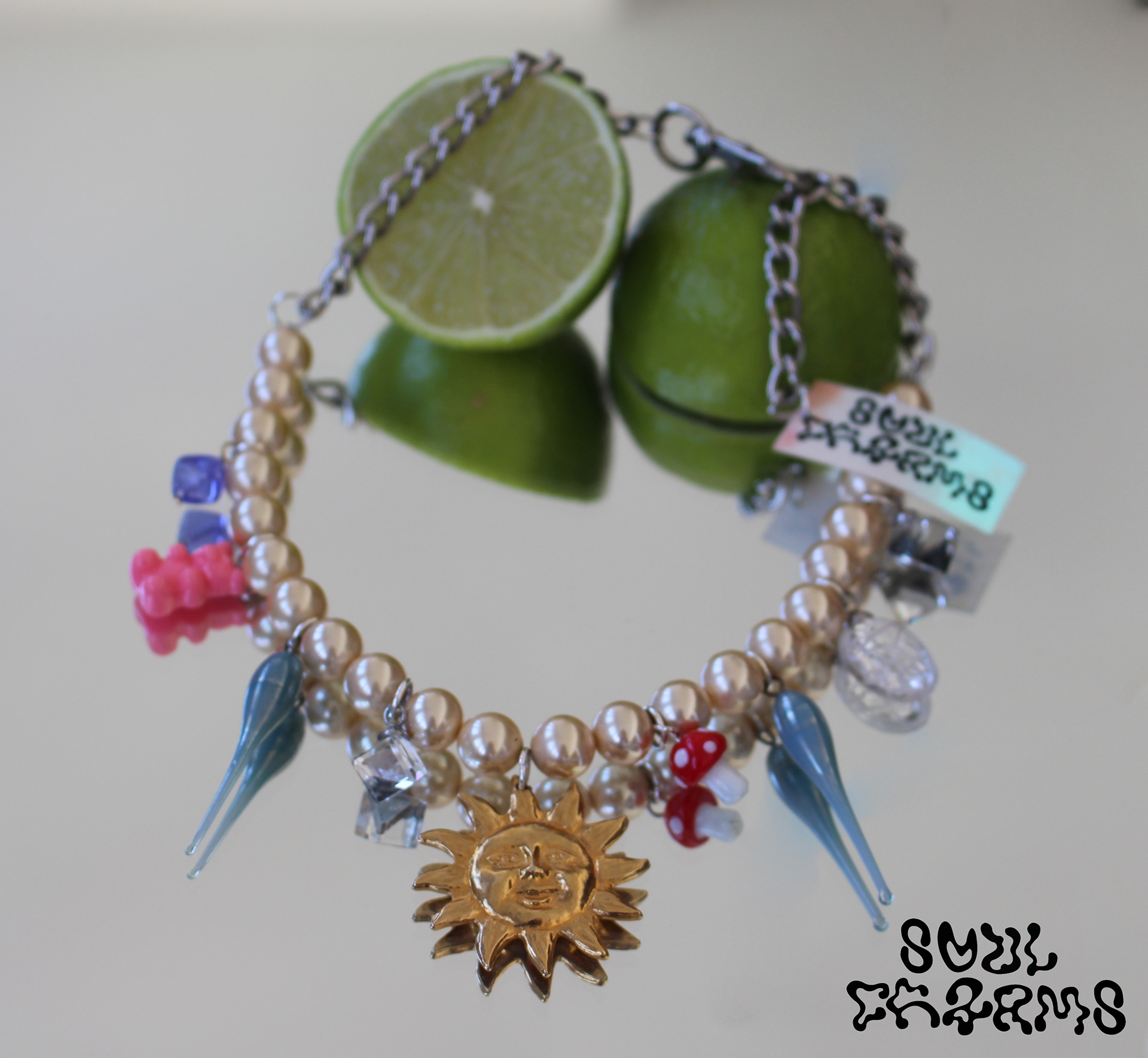 Long choker created with high quality vintage pearls, Swarovski and other charms.