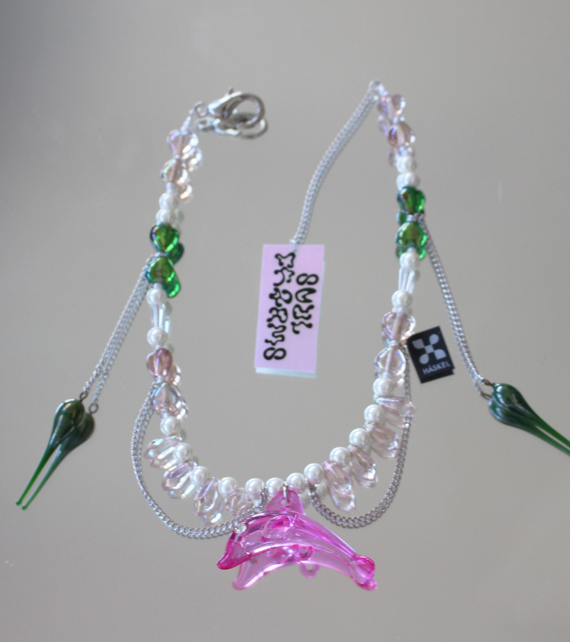 Long choker created with high quality vintage pearls, Swarovski pearls and dolphin charm.