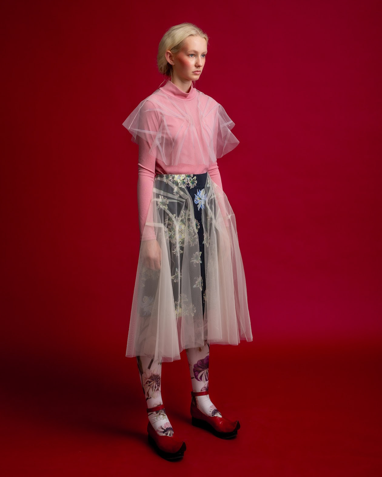 A Tulle tight skirt with Floating Crest Flower print