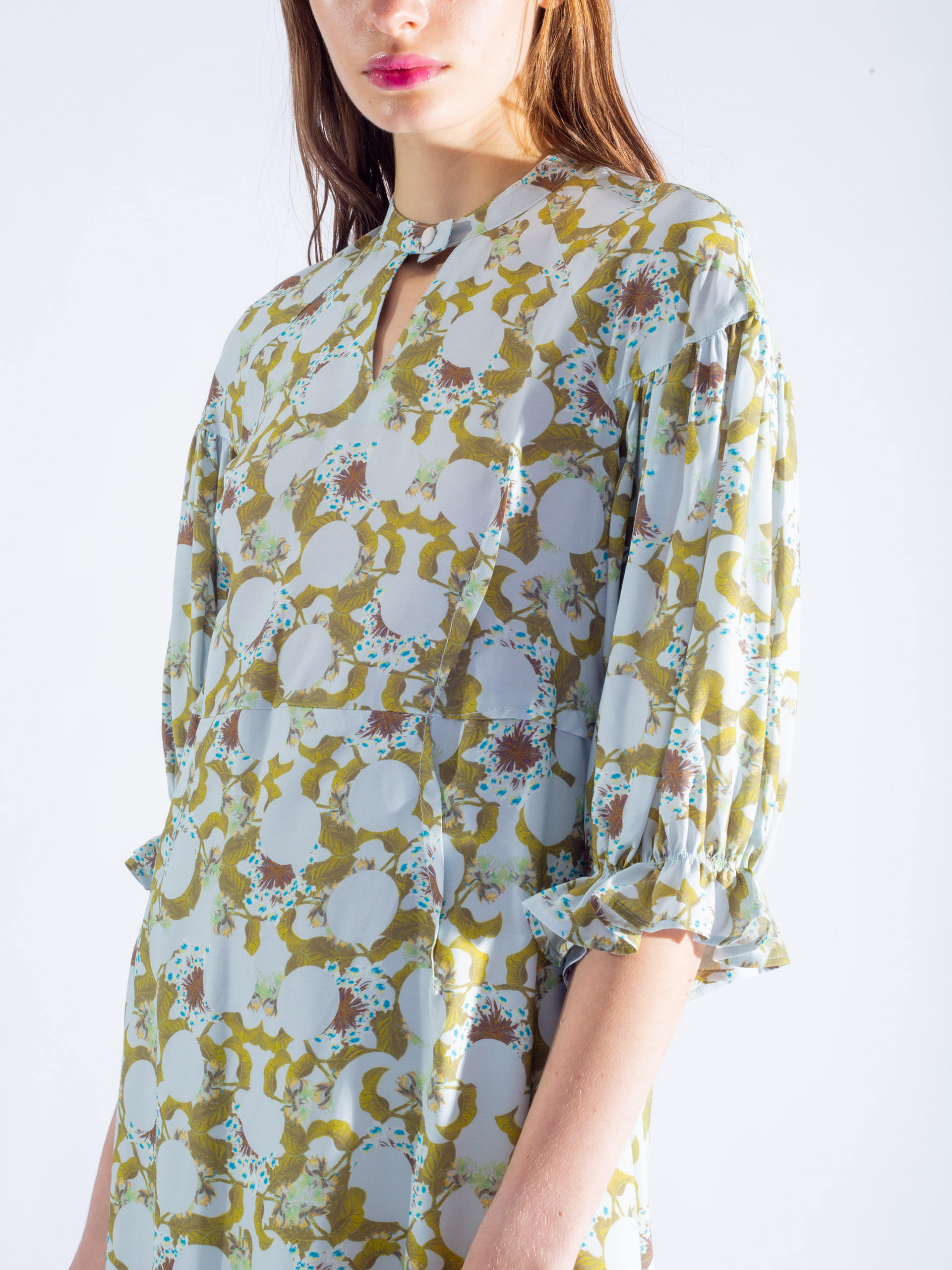 A puff sleeve dress with Floral Geometric pattern