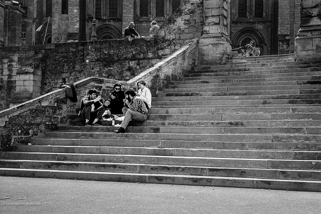 Picnicking on the steps, Laon, France