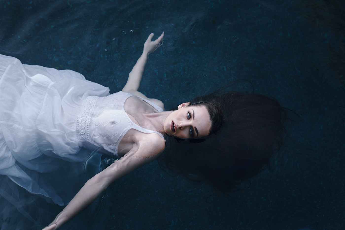 Beautiful girl in water.  Photo by Modern Human