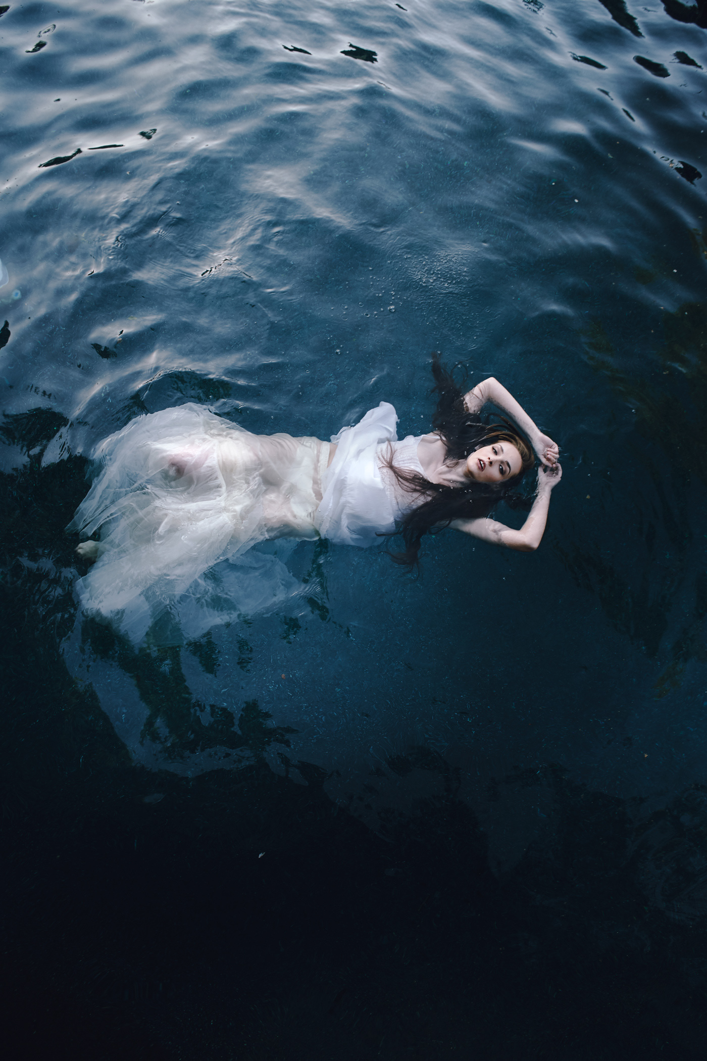 Beautiful girl in water.  Photo by Modern Human
