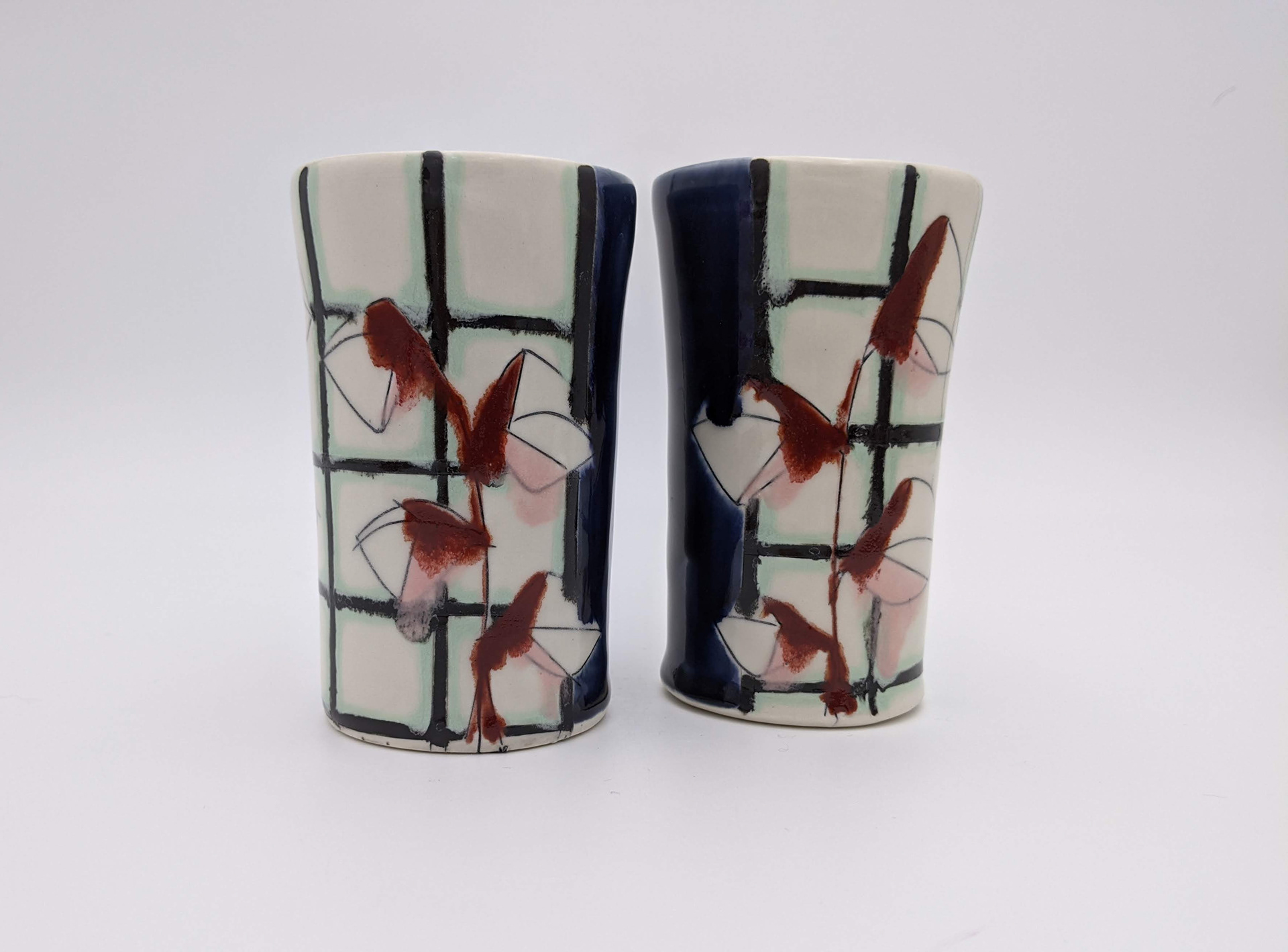 Amy Halko, "Tumblers", Wheel thrown porcelain, 1.5" x 4" each