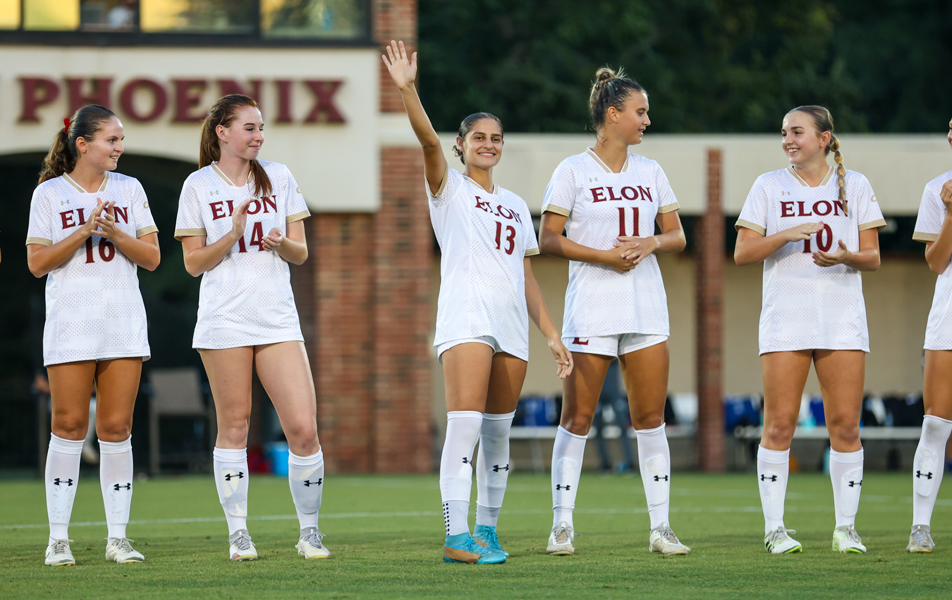 Jenna Abousaab waves to the Rudd Field crowd after being introduced for her first career start against Hampton on Sept. 28.