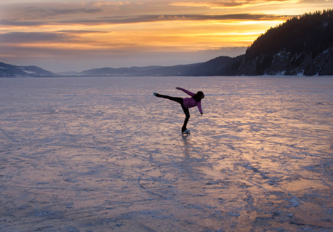 Ice skater in a frozen lake photography