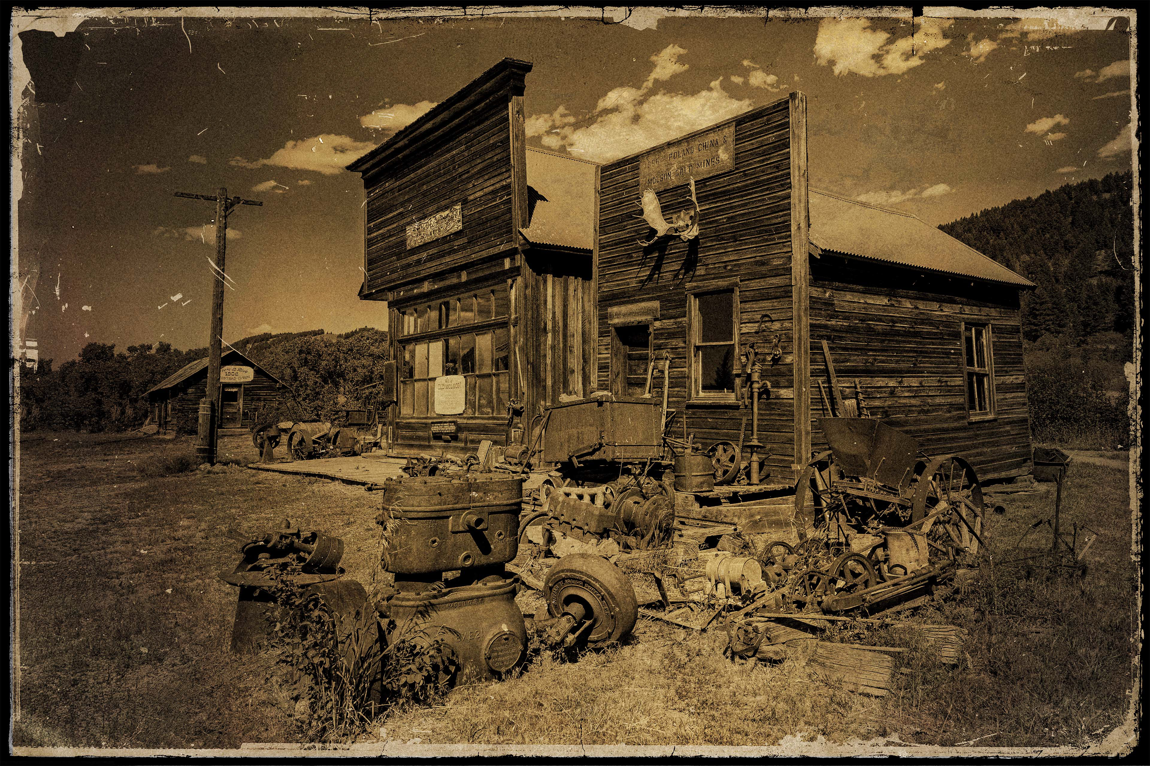Photograph of old, weathered buildings in Molson Washington. 