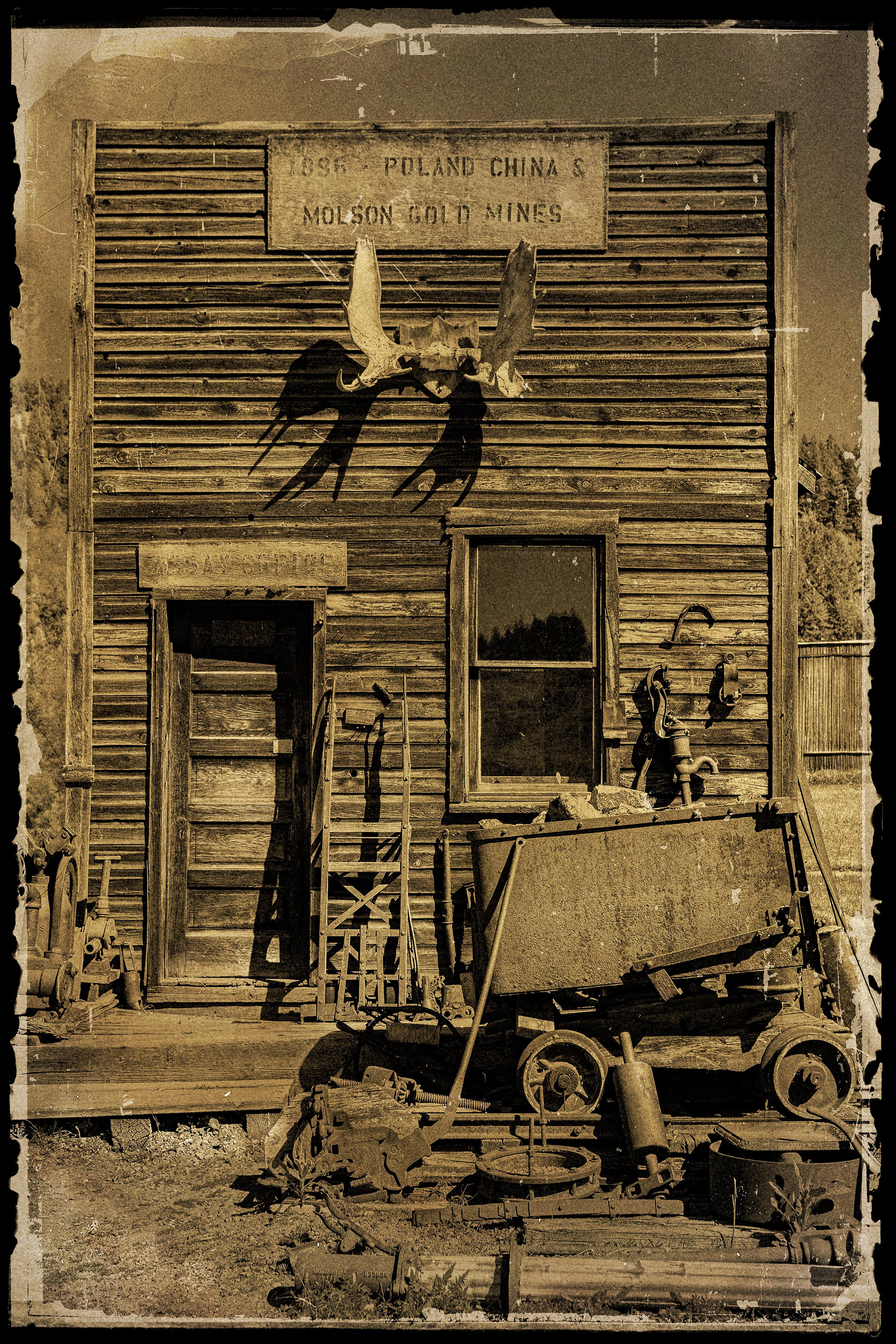 Photography of old, weathered, mining office building. This image was taken in Molson Washington.