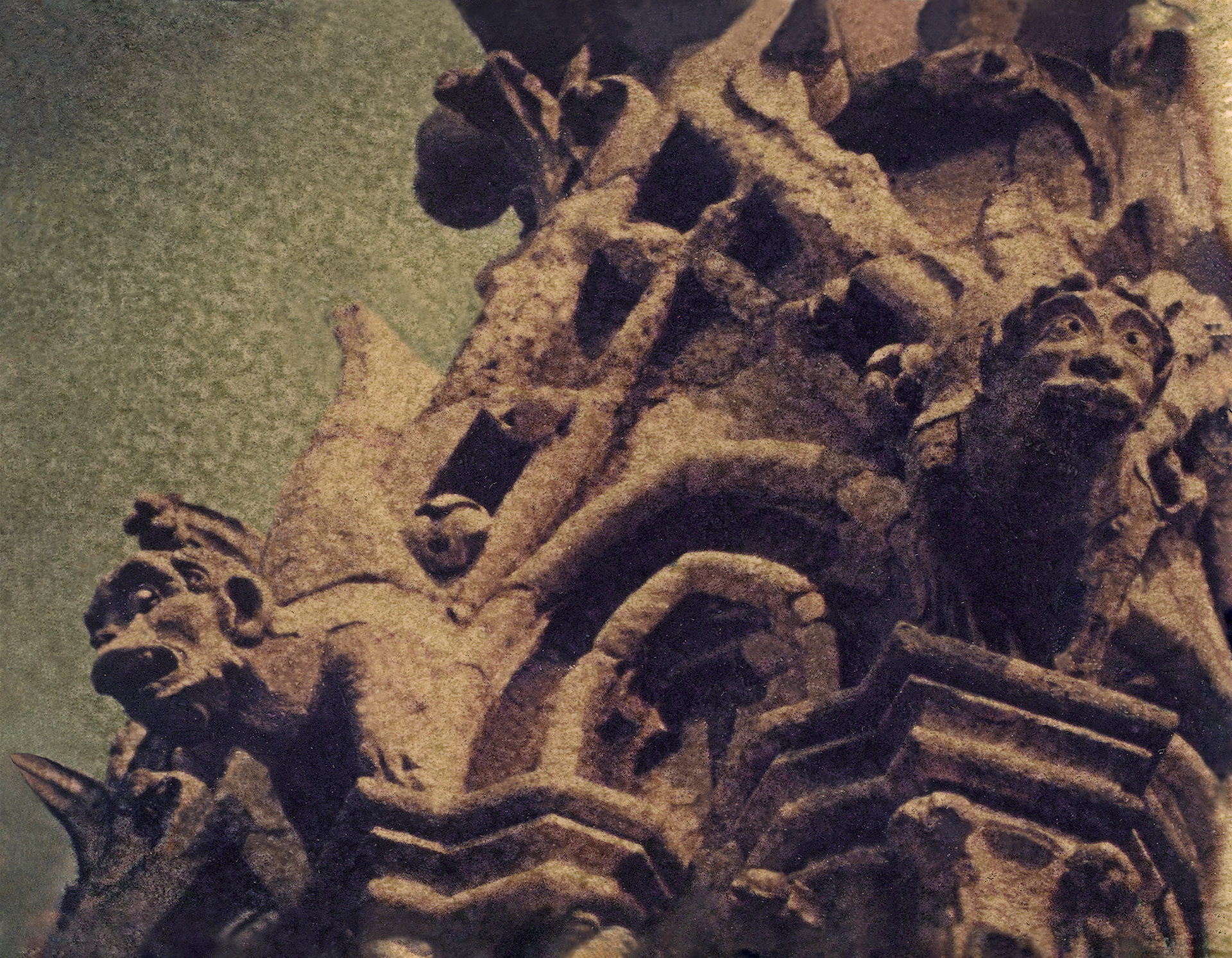 Polaroid transfer of Gargoyles on the side of the Notre Dame cathedral.