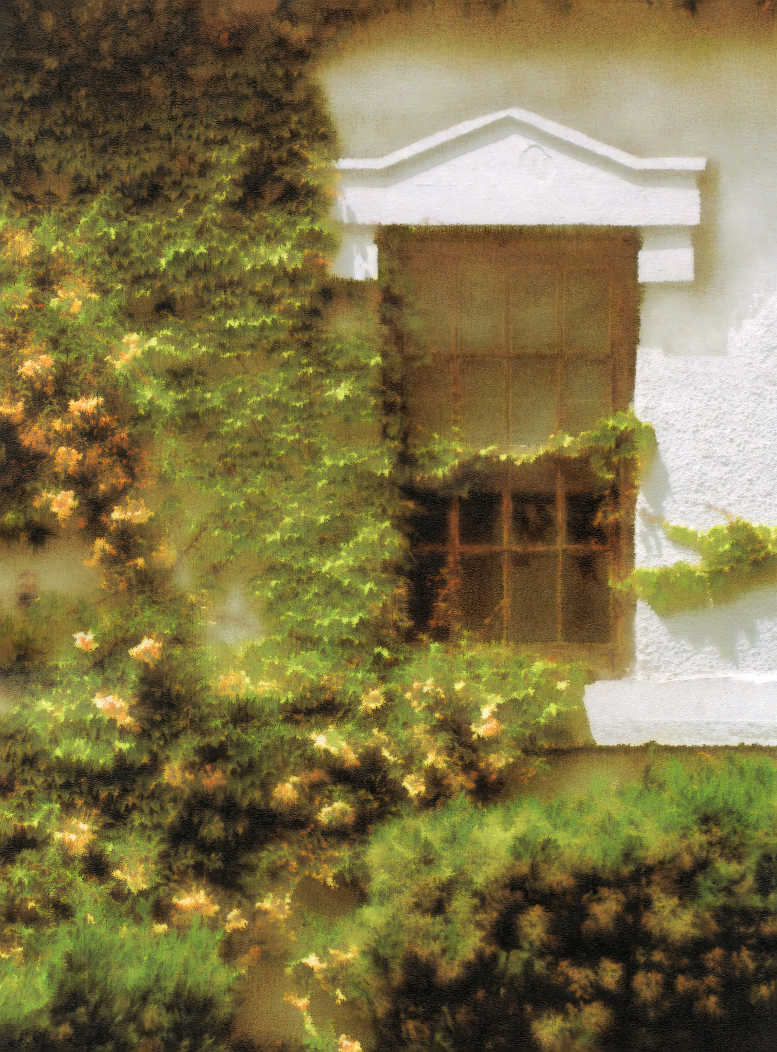 Antique window surrounded by autumn colored ivy.