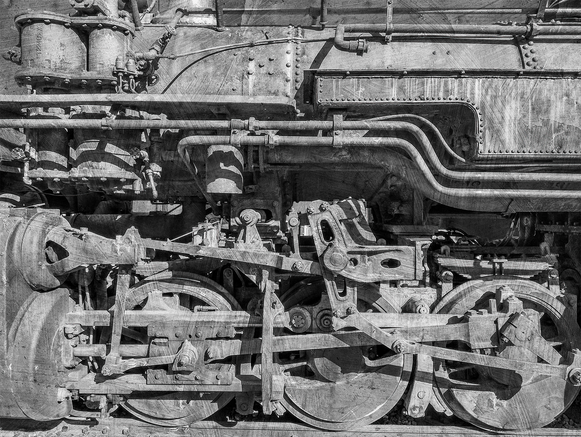 Old antique steam engine captured in black & white.