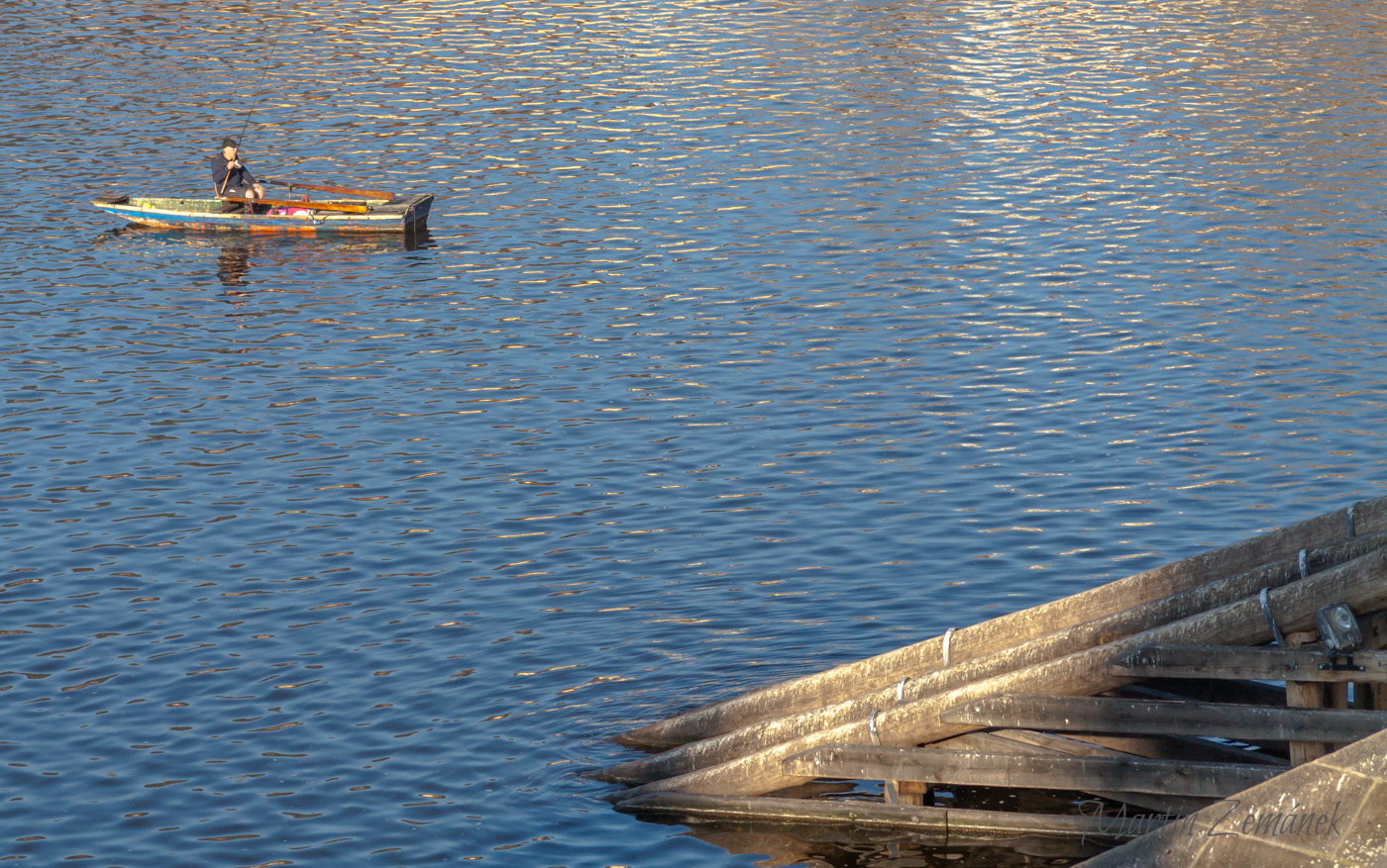 Rybář u Karlova mostu