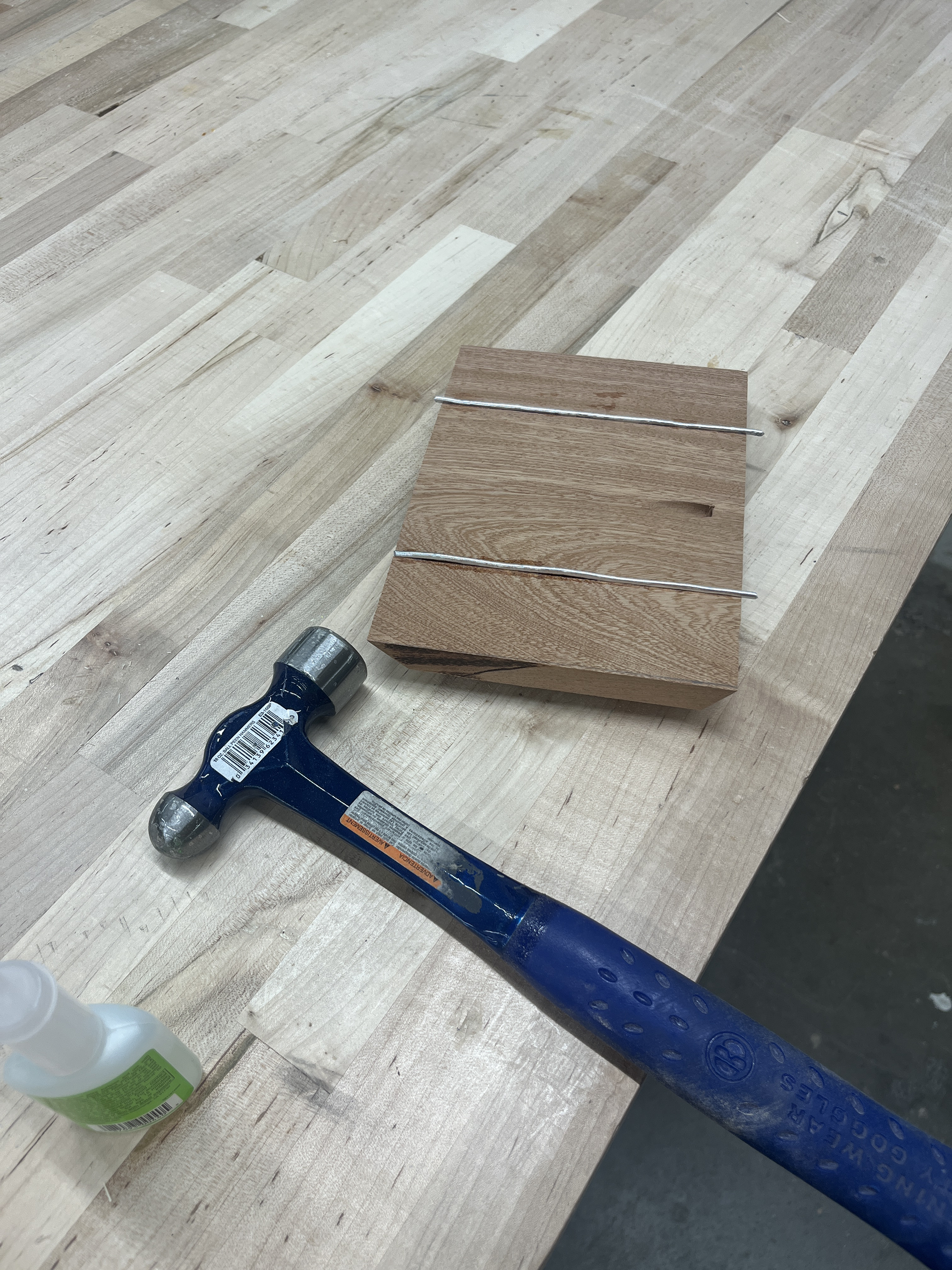 Metal wire being turned to inlays