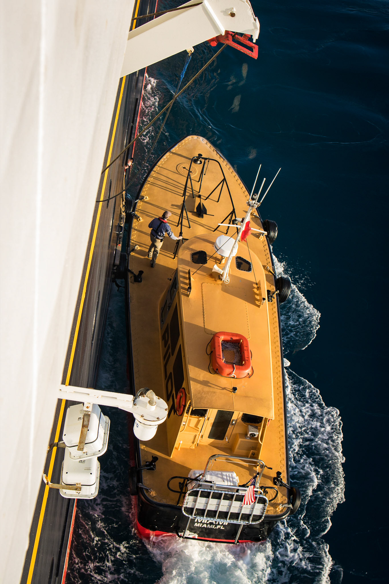 Biscayne Bay Pilot ship escorting the Disney Magic out of the Port of Miami.