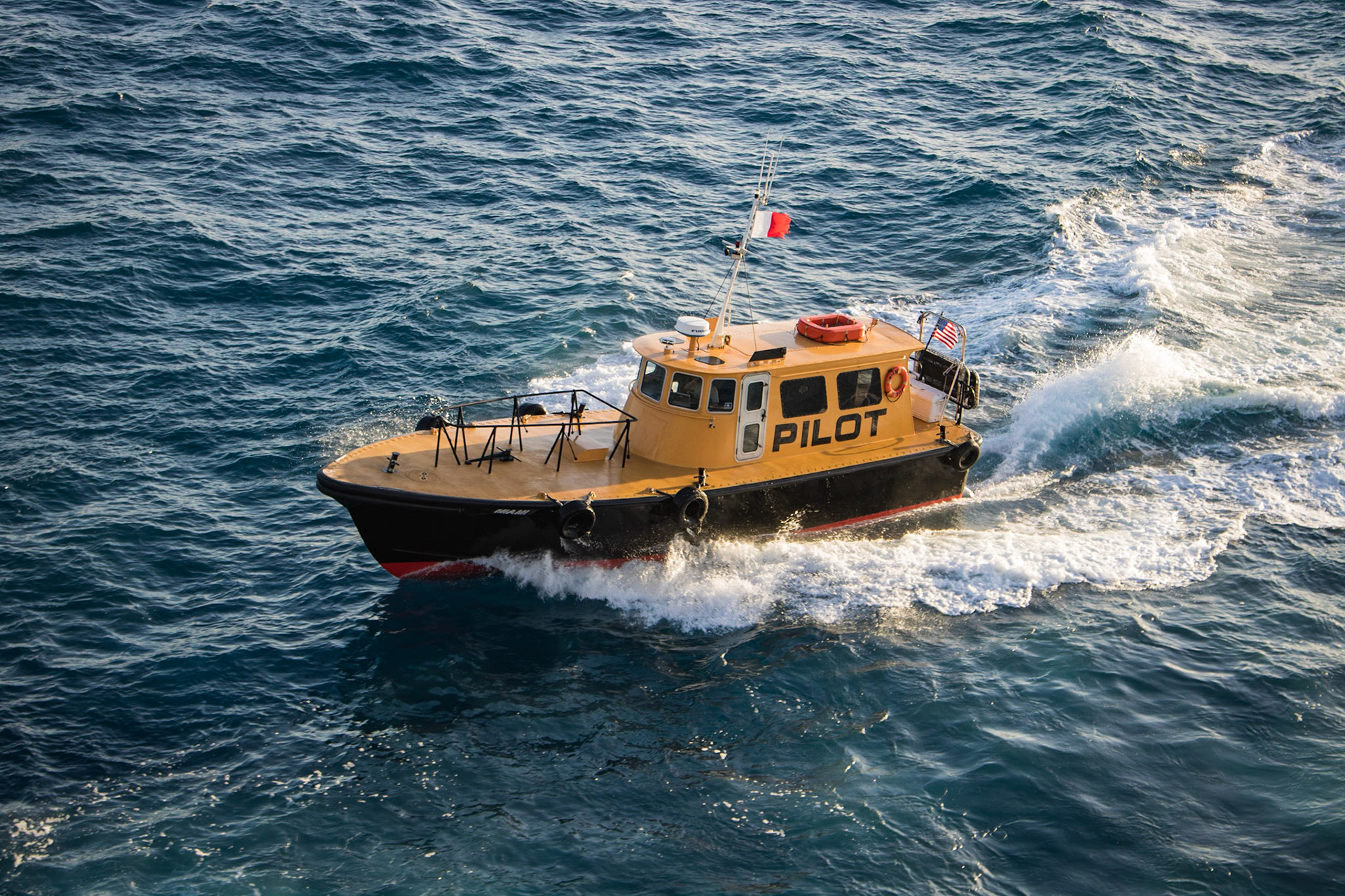 Biscayne Bay Pilot ship escorting the Disney Magic out of the Port of Miami.