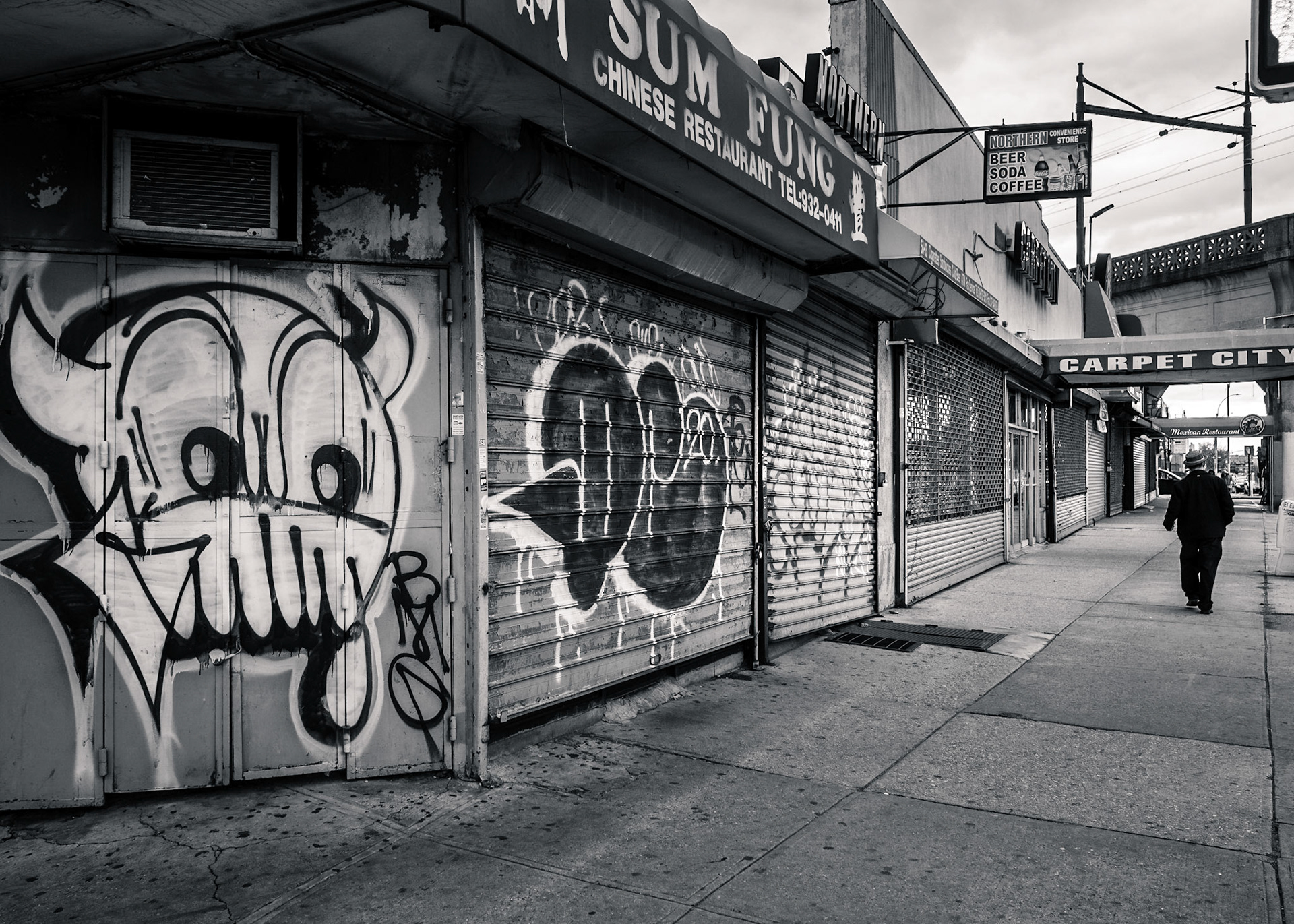 Grafitti covered storefronts on Northern Boulevard in Queens, NY. Taken one year ago during lockdown 2020. #lockdownphotojournal