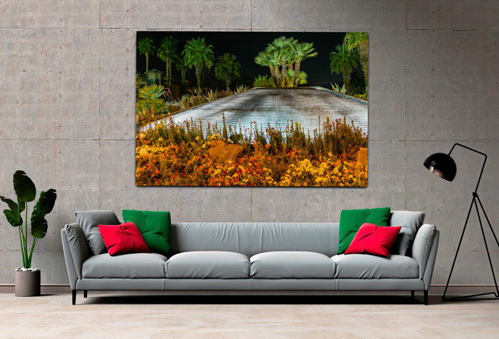 This photo artwork captures the beauty of nature in a stunning way. The falling water from the palms creates a soothing sound and a refreshing spray. The plants and flowers add color and contrast to the scene, creating a harmonious composition. Photo Artwork is a perfect choice for anyone who loves tropical landscapes and wants to bring some of their charm into their home or office.