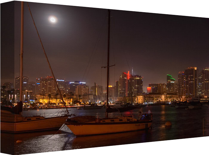 City Lights Stretched Under A Full Moon